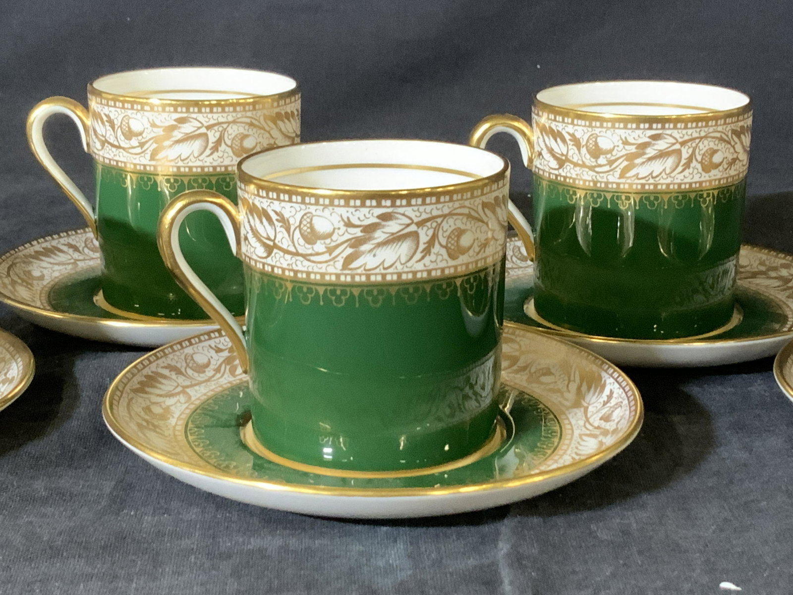 SPODE Oaklea Demitasse & Saucer Set 10, England: Hand Painted Fine Bone China Demitasse Set with 5 Demitasse cups and 5 matching saucers. Hallmarked Spode OAKLEA pattern with intricate leaf and acorn gilt pattern on white porcelain and a cheerful hu