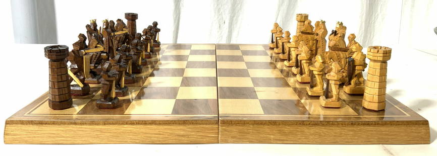 Set 32 Carved Wooden Chess Set & Board: Board measures approx 17 inches square. Lot includes all 32 chess pieces. , 16 tan & 16 brown. Each piece appears to be carved wood, possibly carved by hand. Lot includes green toned felt. Chess set,