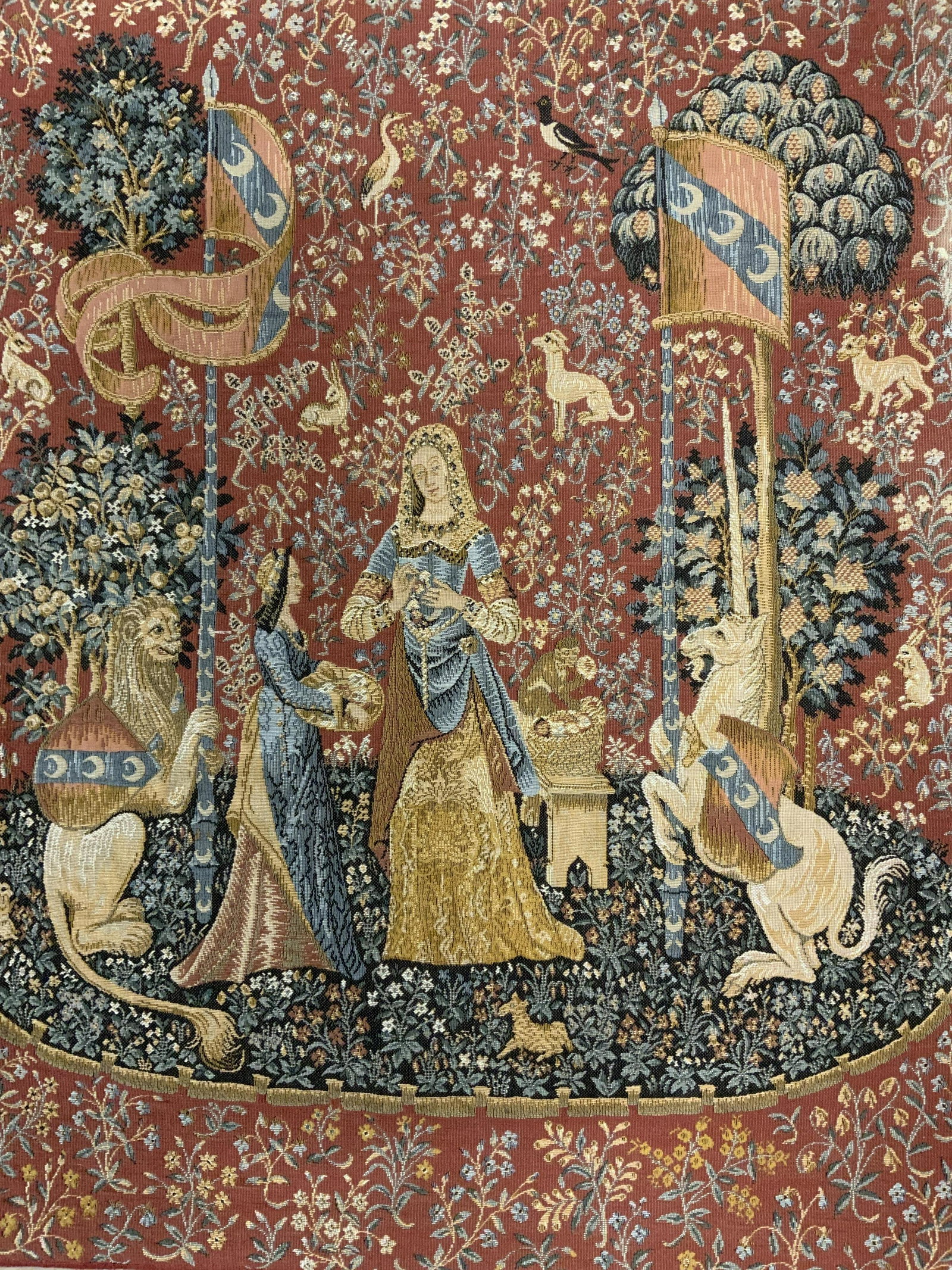 The Lady with the Unicorn Wall Tapestry: The Lady with the Unicorn Wall Tapestry, Smell Motif, verso reads ‘The Lady and The Unicorn… made in Belgium by Ter Waes Ltd for American Express Co.’, subject a lady with her ladies maid surrou