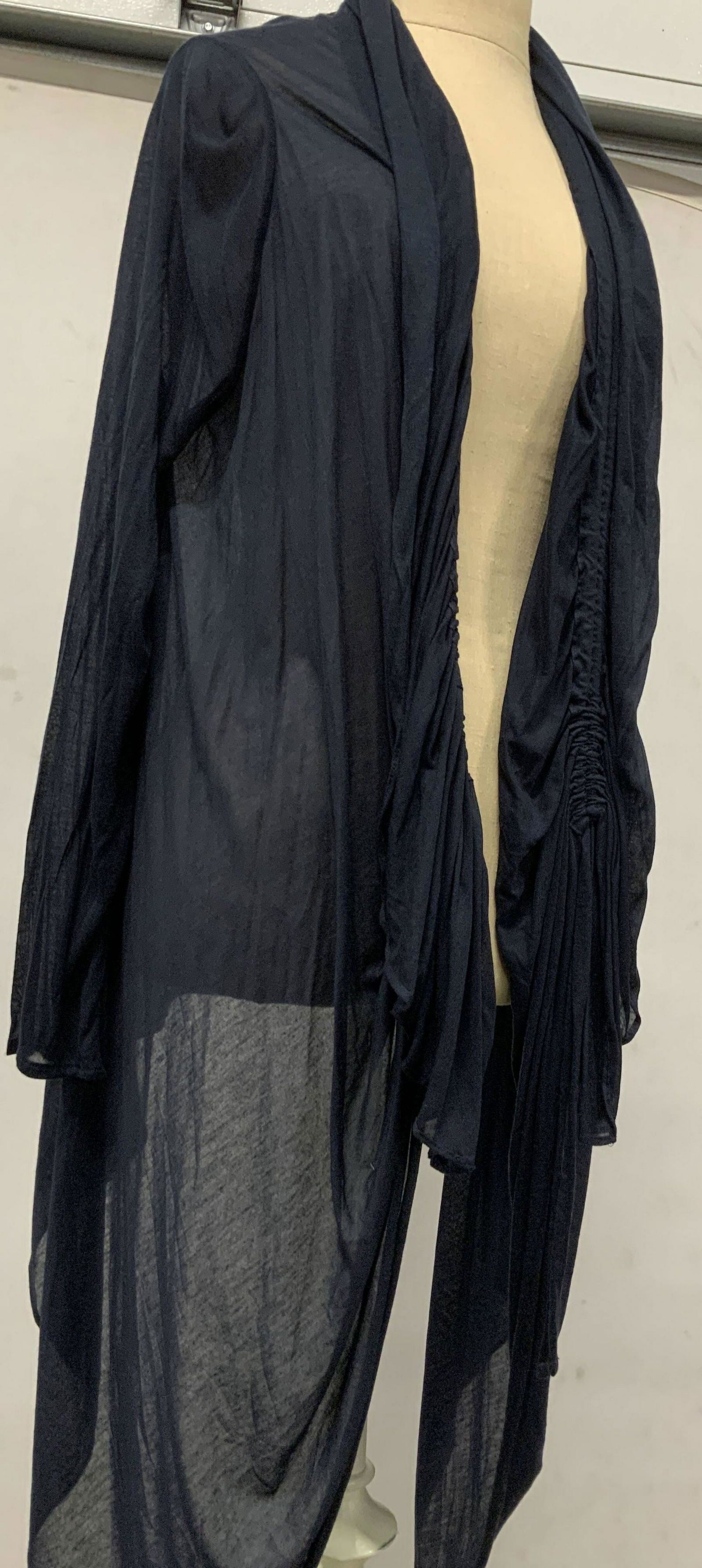 ELIE TAHRI Navy Cotton & Cashmere Drape Cardigan: Labeled Elie Tahari lightweight and sheer Knit cardigan. 80% Cotton, 20 % cashmere. Size L, should fit XL, Shawl collar I has a it of stylish ruffle. Elegant and simple. Dress up or down. ladies estat