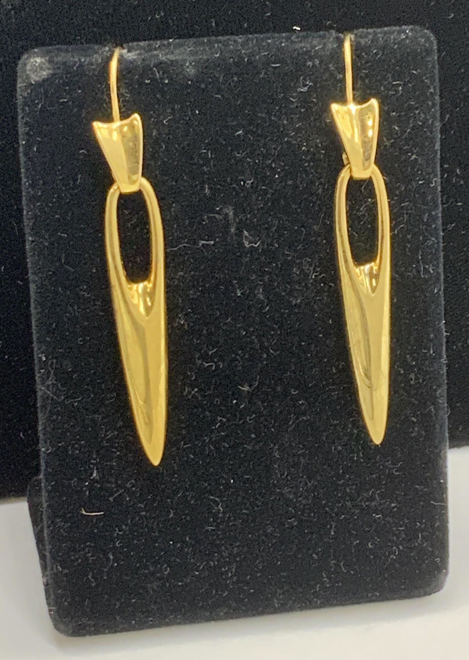 RLM Needle Style Dangle Earrings, Jewelry: Signed Robert Lee Morris Earrings in polished gold tone with fish hooks, in the style of a needle. Drop is 2 in. ROBERT LEE MORRIS When RBL Artwear opened in 1977, the store instantly became a part of