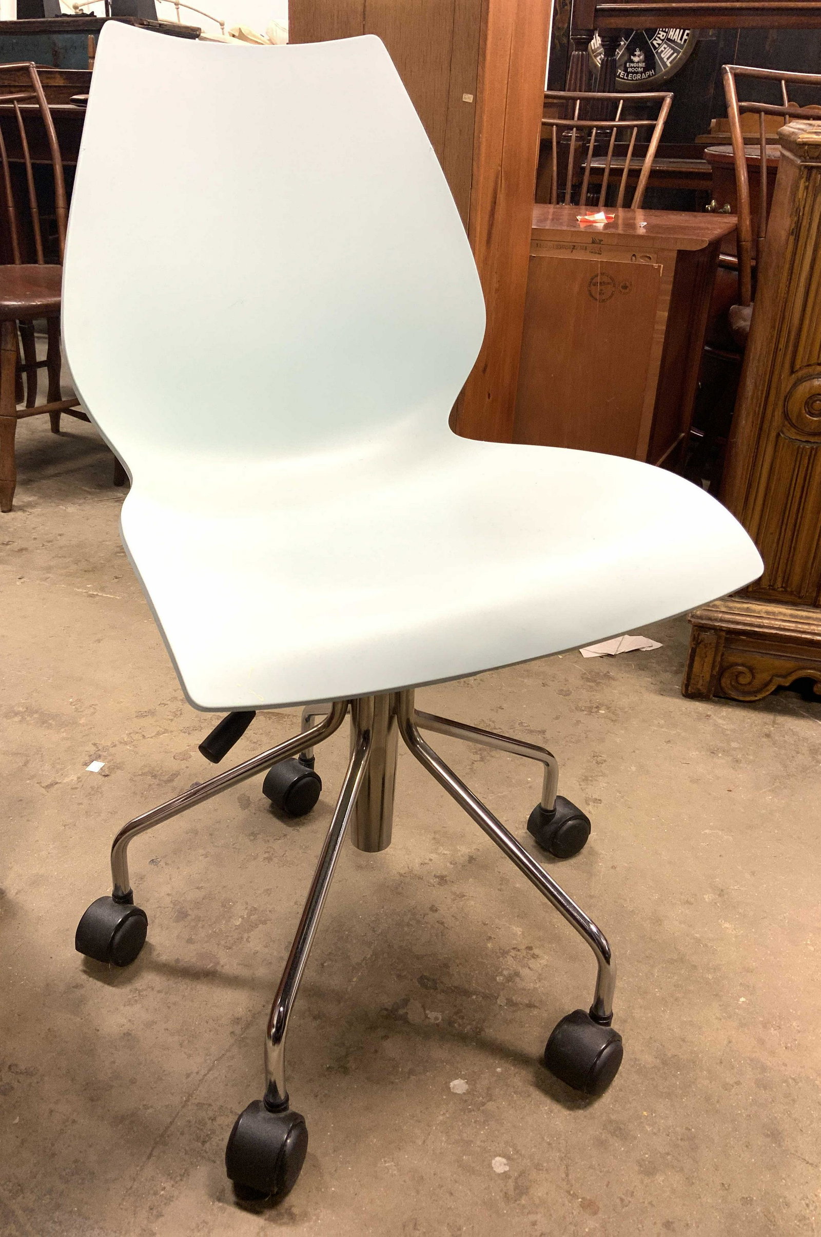 KARTELL MAUI VICO MAGISTRETTI Italian Comp Chair: Underside reads KARTELL MAUI VICO MAGISTRETTI MADE IN ITALY. Chair is powder blue toned. Piece is mid century Modern. Chair sits on 5 wheels. Piece measures approx 32 inches tall 18 inches wide 21 inc