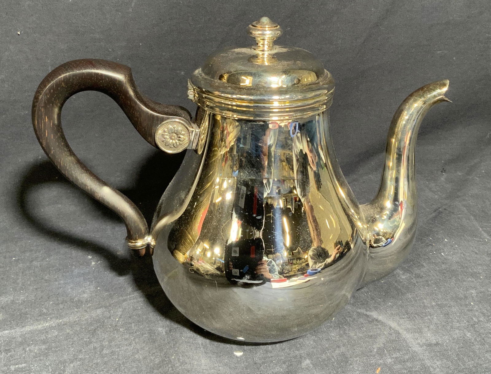 Luxury CHRISTOFLE Silver Plate Teapot: Luxury CHRISTOFLE Silverplate Teapot, underside reads ‘Christofle’, measures 9 l x 5 w x 7 h inches, wear consistent with age and use. CHRISTOFLE, CHRISTOFLE Silver, Christofle silver plate teapot