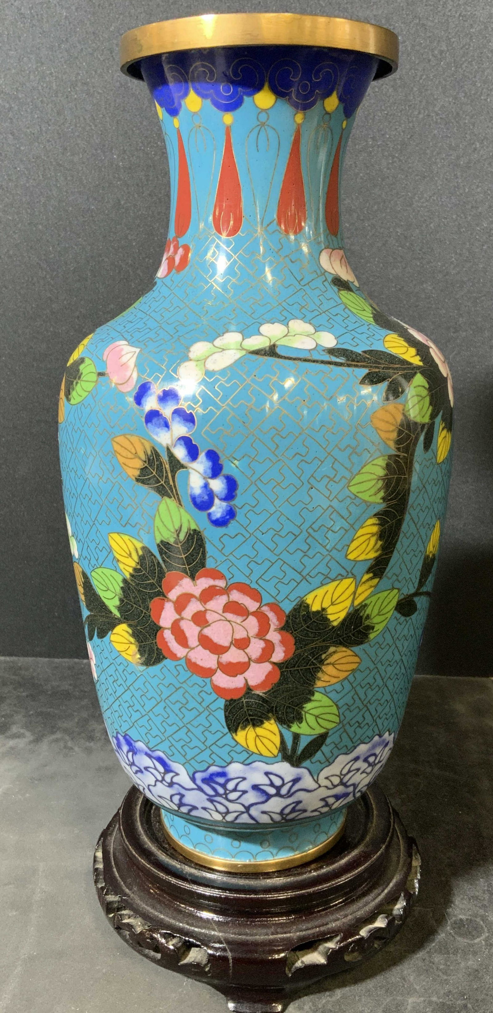 Vintage Asian CloisonnÃ© Urn: Asian cloisonnÃ© urn. Depicts multi toned floral patterns. Includes a wooden base. Wear is consistent with age. Measures approx 9.25 inches h and 5 inches w. Asian decorative arts, Home decor, decor