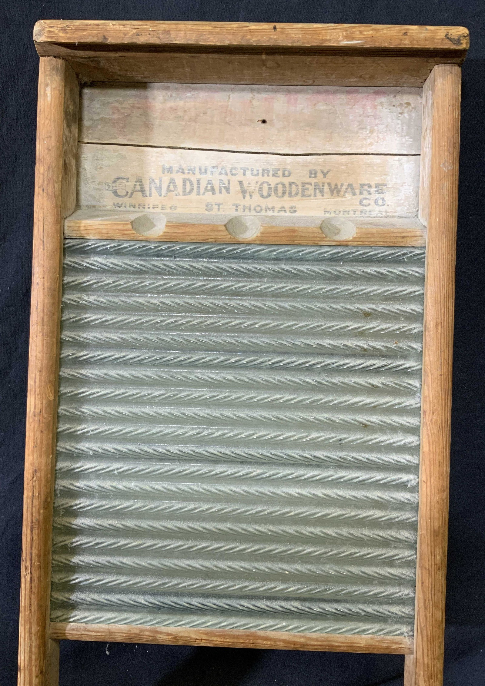 Antique WASHBOARD GLASS CANADIAN WOODENWARE CO.: Antique WASHBOARD GLASS CANADIAN WOODENWARE CO., measures 12 3/8 x 23 5/8 inches. Made of wood with ribbed glass for scrubbing, wear consistent with age and use. antique, antique decor, antique wood, 