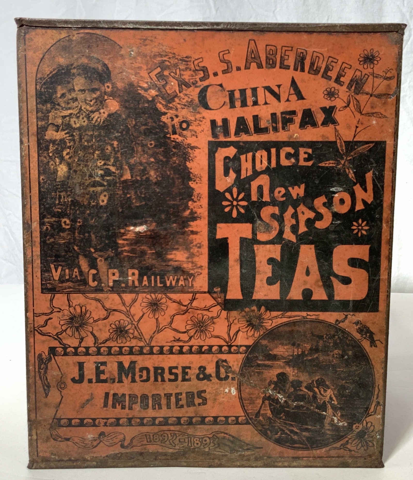 Antique C. 1890s HALIFAX Metal Tea Tin: An antique Halifax rust orange tea tin, with depictions of children, and graphics using different typefaces, and motifs of flowers. The obverse side of the tin reads ‘Ex.s.s. Aberdeen China Halifax�