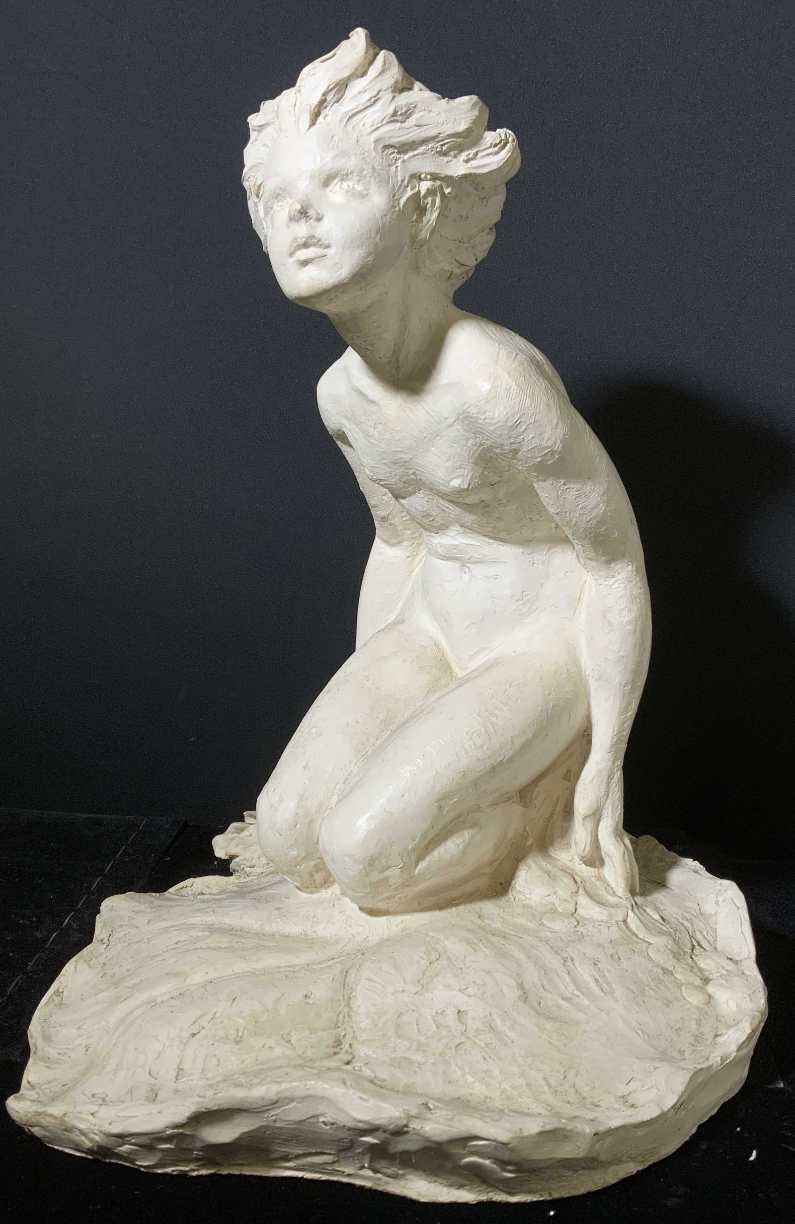 Plaster Female Figural Sculpture: Plaster Female Figural Sculpture. Female art nude, apparently unsigned. Measures 16 in long by 14 in wide, 19 in tall. Minor scratches and discoloration. art nude, sculpture, home decor, fine art,