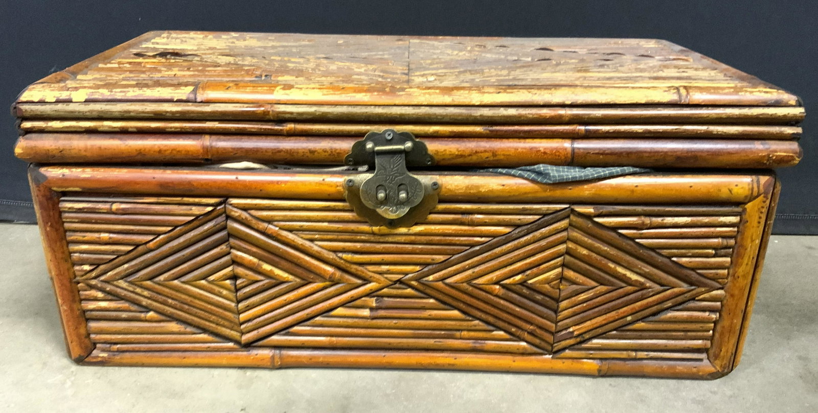 Vintage Wooden Bamboo Chest W Lid: Chest is vintage possibly antique. Piece appears to be crafted from bamboo. Chest appears to possibly be hand crafted. Piece has gold toned metal locking mechanism which appears to be brass. Chest has
