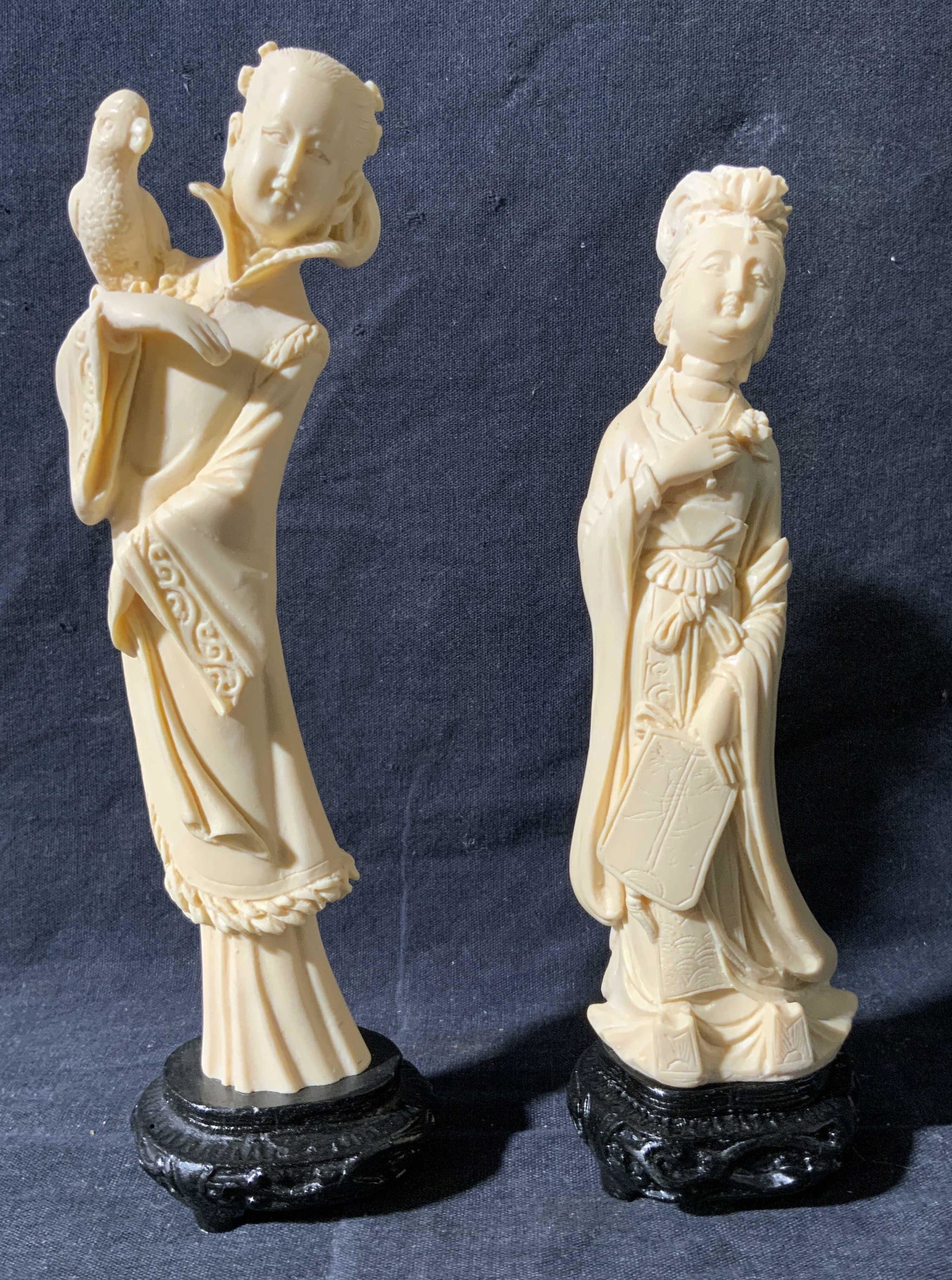 Lot 2 Leaning Women Bone Statues: Lot 2 Leaning Women Bone Statues, no apparent inscriptions or marks to piece, subjects two eastern Asian women sculptures leaning towards their left, measures 7 1/2 and 7 inches tall, surface wear to 