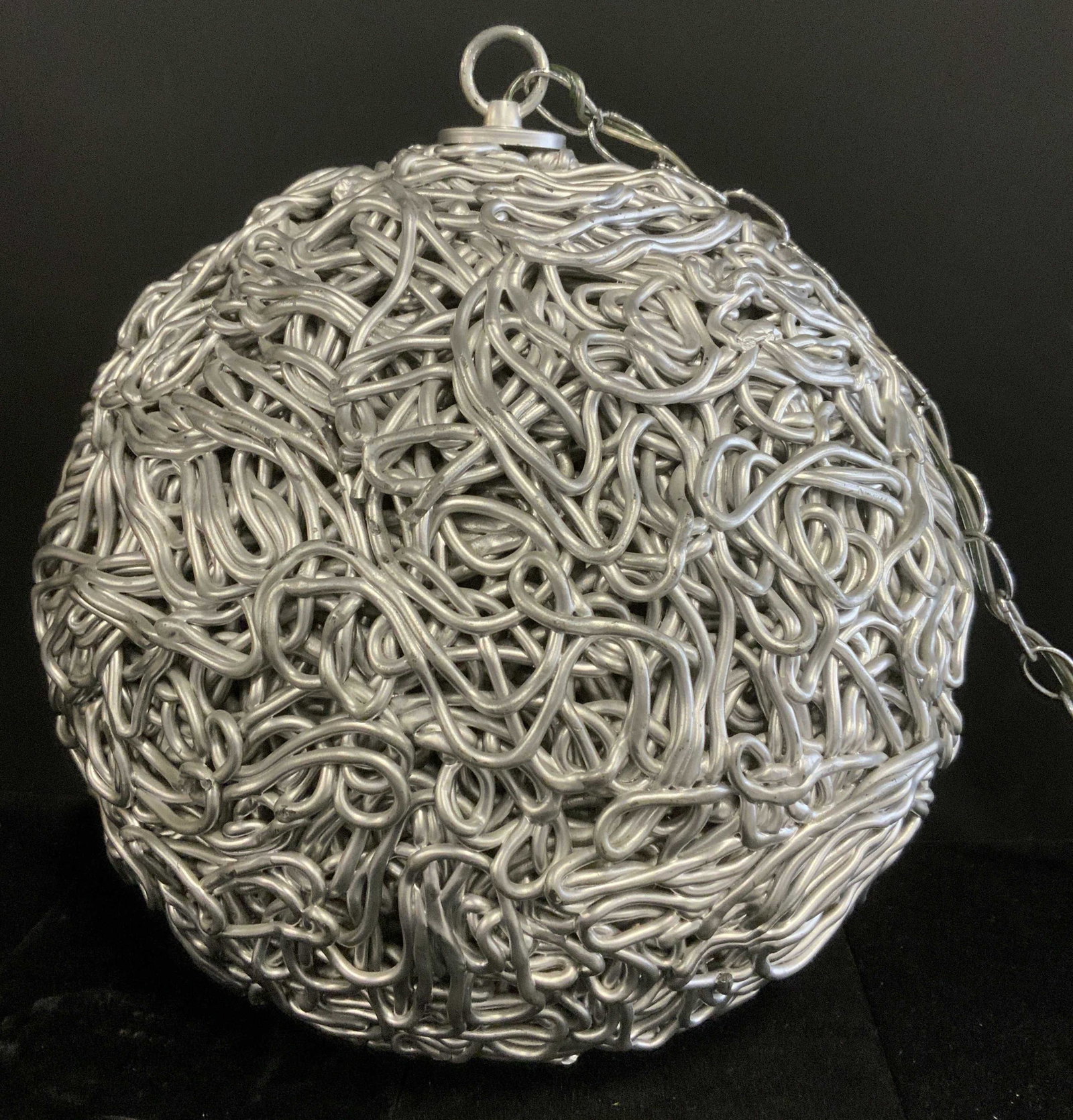 Spun Composite Pendant Light: Spun pendant light. Crafted from a composite material and painted silver. Functionality has not been tested. Wear is consistent with age and use, loss to piece present. Measures approx 16 inches h and