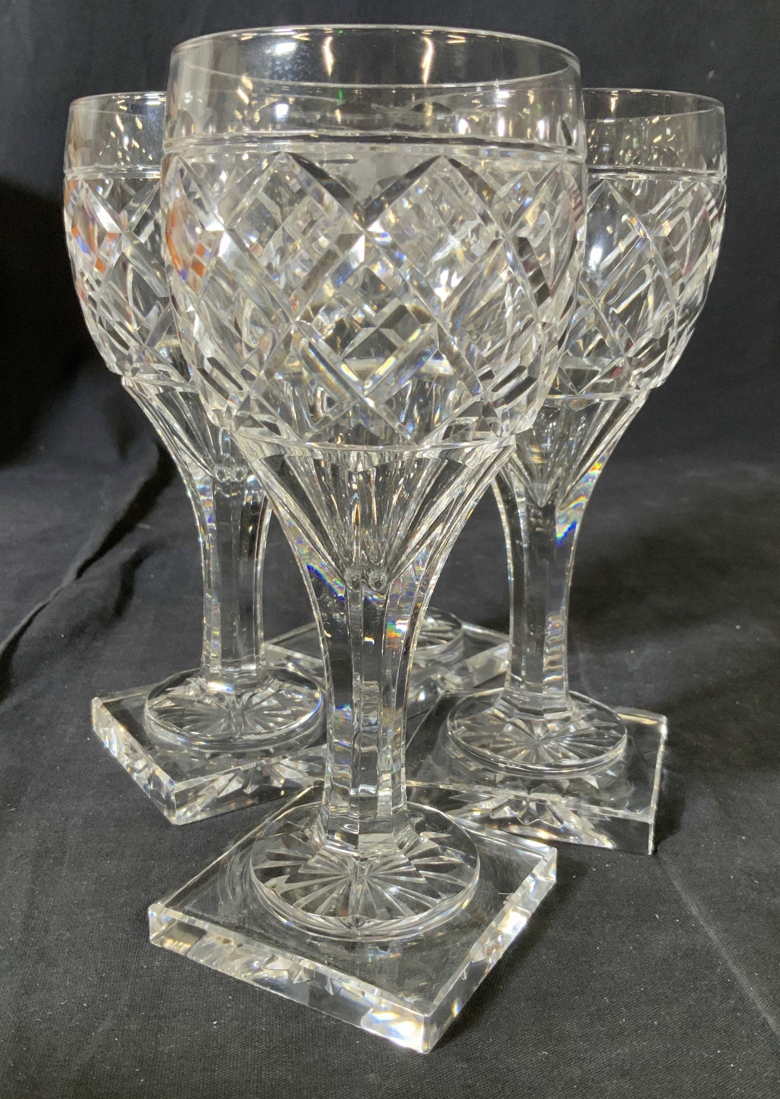 Signed Val St. Lambert Set 4 Crystal Glasses: Rare set of 4 crystal Stemware by Val St. Lambert in Gondole Losanges Pattern (The waffle or diamond pattern). 7 in. Ht . The distinctive base of the stem is a beveled crystal square, featuring a a cu
