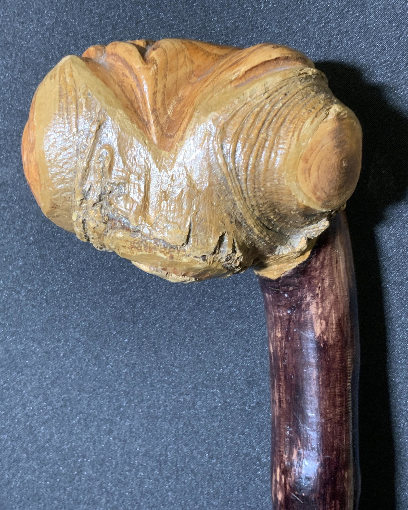 Vintage Carved Wooden Walking Stick: Vintage walking stick, wooden, metal ferrule. Wear is consistent with age and use, some chipping to wolf ears. Measures approx 36 inches long, 3.25 inches wide. Walking stick, carved bone, carved resi