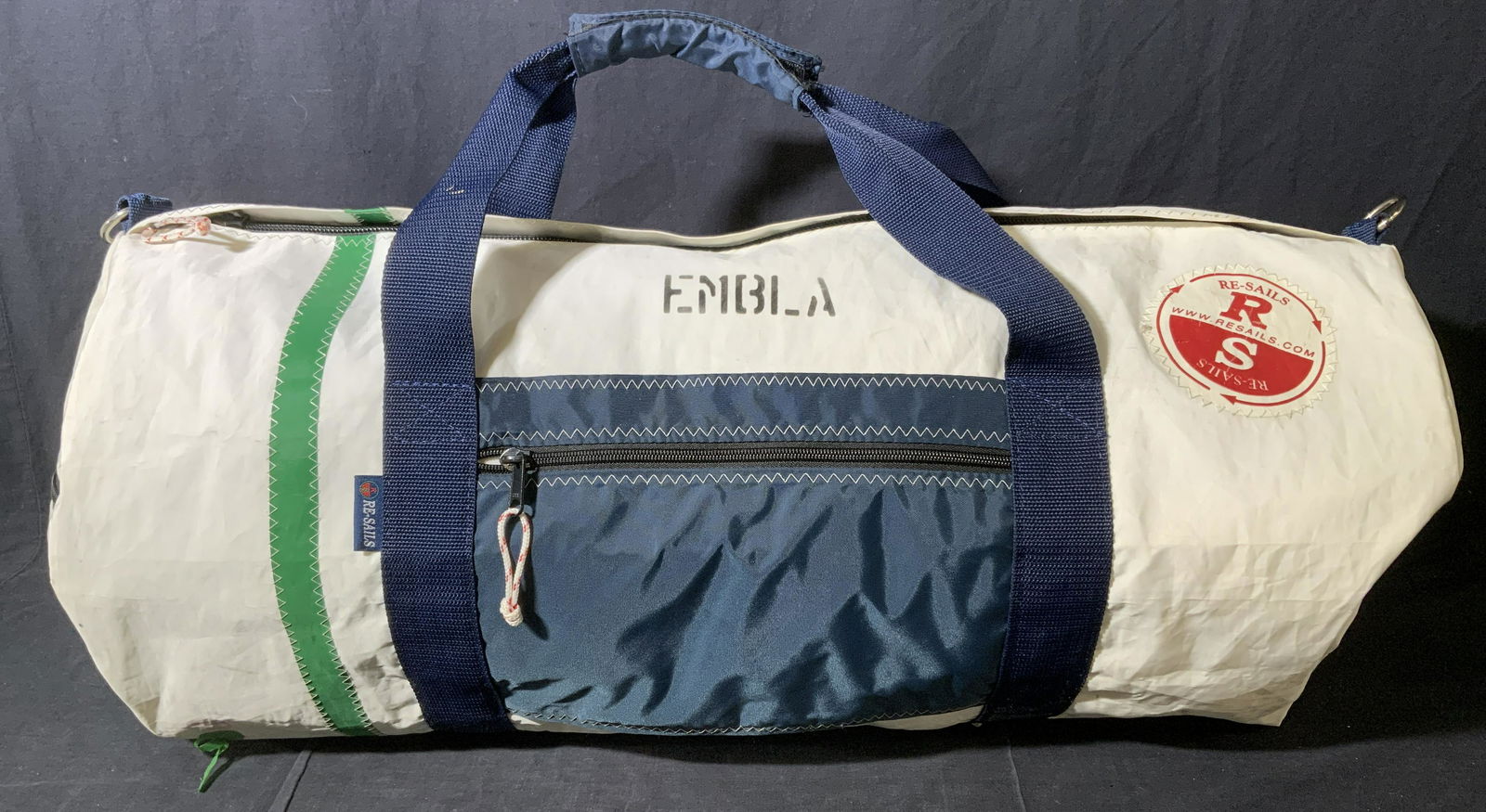 RE-SAILS Tote Bag: RE-SAILS Tote bag. Crafted from recycled sails. Wear is consistent with age and use. Measures approx 13 inches h and 30 inches long. Front and end zippers. Labeled RE-SAILS. tote bag, gym bag, duffel