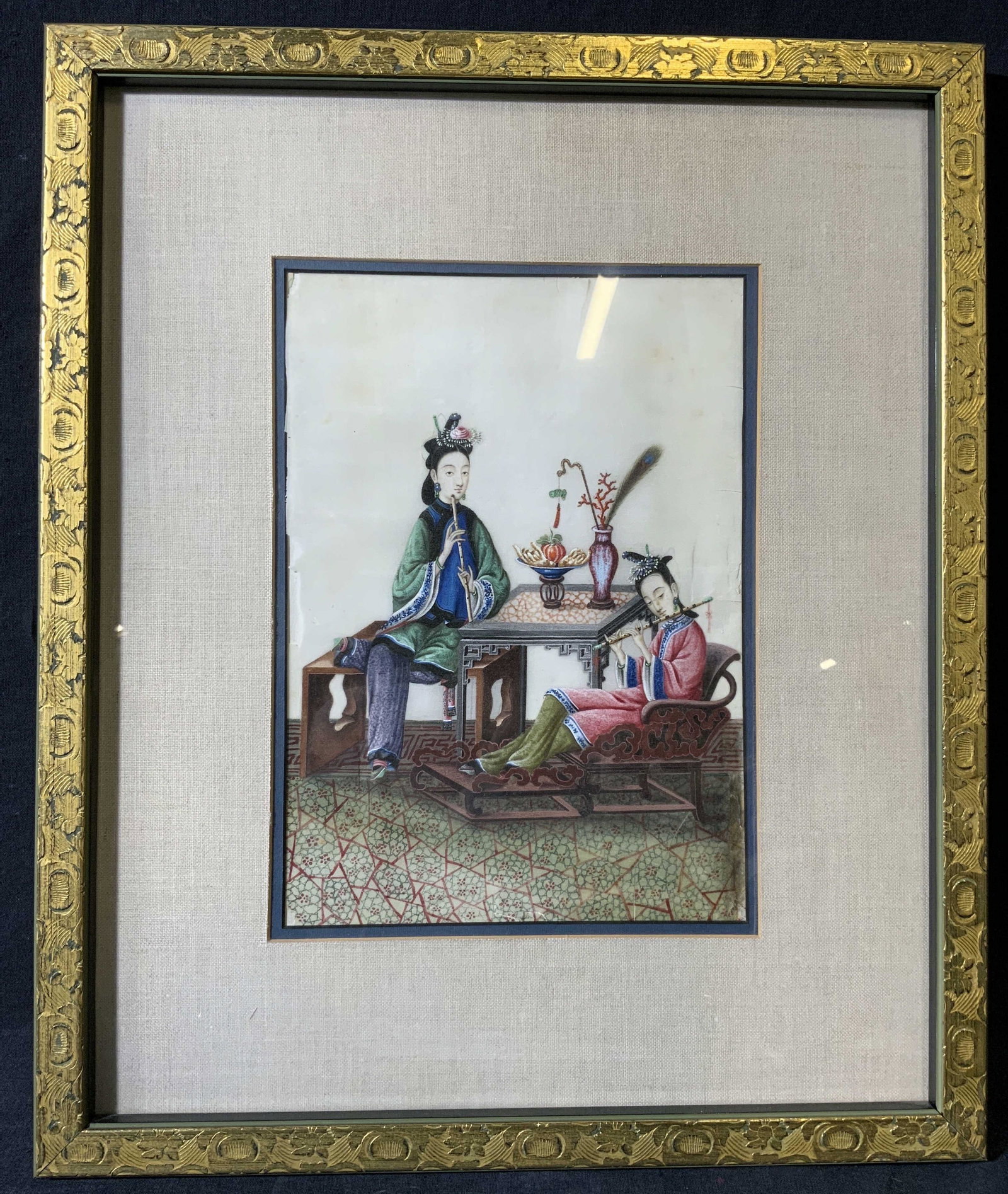 Two Women Playing the Flute Pigment on Paper: Two Women Playing the Flute Pigment on Paper, no apparent inscriptions or mark to piece, subject one seated woman and one reclining woman both playing flutes, frame measures 15 1/2 x 18 1/2 inches, wi