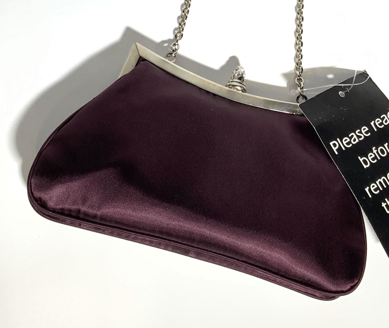 NEWPORT NEWS Amethyst Tone Ladies Purse NWT: A deep amethyst toned soft hand polyester fabric ladies purse. Silver tone hardware and bejeweled snap closure. Interior is lined. Interior tag reads Newport News. Interior tag to side reads 100% Poly