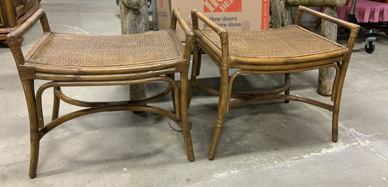 Pair Caned Bamboo Benches: Lot includes 2 bamboo benches, seats are each caned. Benches are tan toned and wooden. Each measures approx 21 inches h, 23 inches w, 16 inches deep. Benches, bamboo benches, caned benches, caned bamb