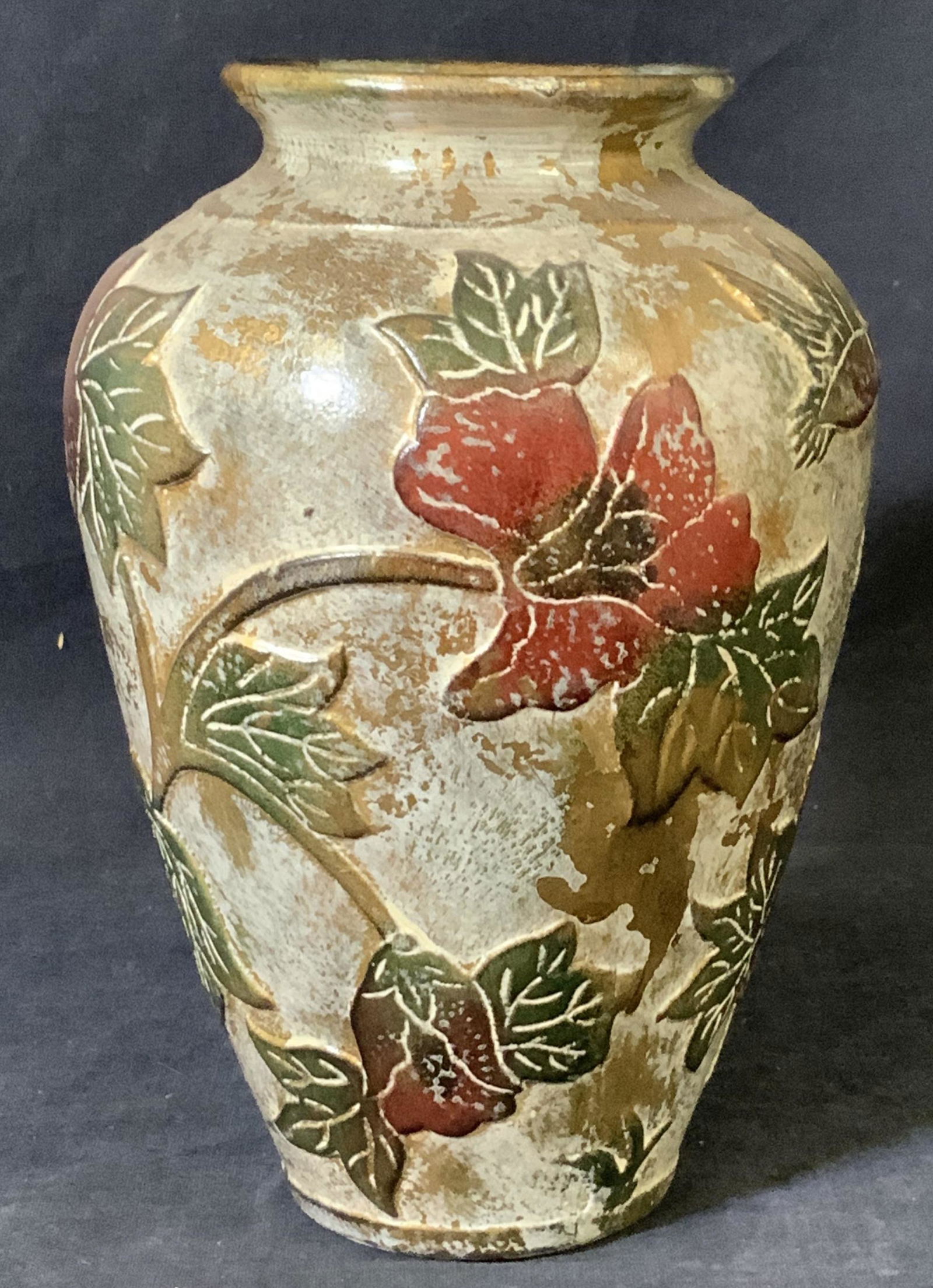 Hand Painted Vintage Ceramic Hummingbird Vase: Ceramic Vase in relief with Flying hummingbird feeding the nectar from a flower. Majolica Style Vase, white wash and gilt mixed with red tropical florals and green leaves. Measures 8.5 in. Ht, 6 in. W