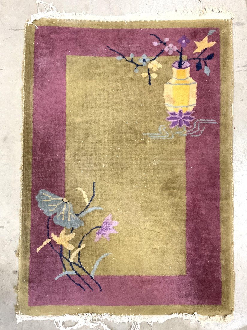 Vintage Handmade Chinese Art Deco Wool Rug: Rug is vintage possibly antique. Piece is handmade and wool. Rug has multi toned floral, leaf & vase detail. Base tones are olive & magenta. Piece measures approx 36 inches long 24 feet. Rug, Chinese 