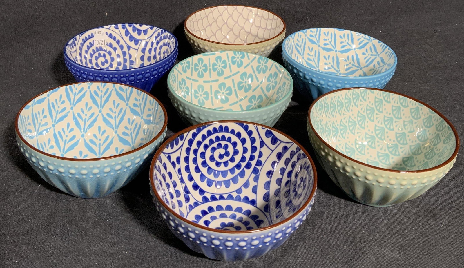 New Old Stock Ceramic Mini Bowls, lot 7: New Old Stock Ceramic Mini Bowls, lot 7, comes in various colors and bright blue patterns, measure 4 1/8 in in diameter, 2 1/8 inches tall, from a Westchester Tableware Importer. Never been used from 
