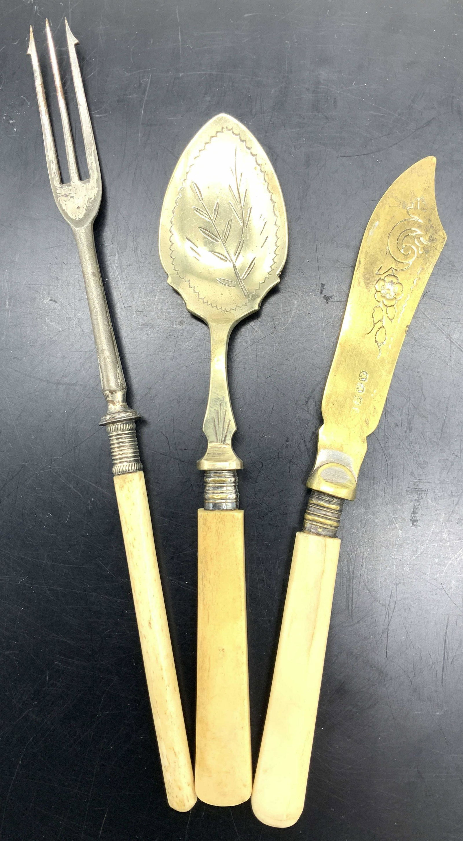 Collectible Bone Handle Assorted Flatware, 3: Vintage Bone Handled Flatware, Silver Plated searing teaspoon, Spreader knife and Cocktail 3 prong fork, 8.5 in. Labeled EPNS with various maker’s stamps. Bone flatware, Vintage Carved Bone flatware