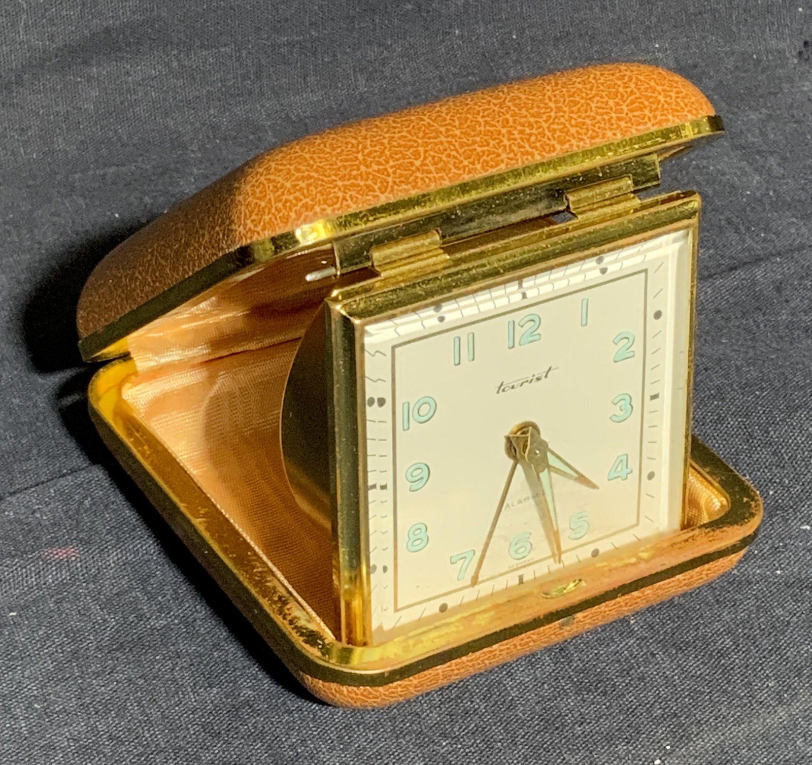 Vintage TOURIST Pocket Clock: Vintage TOURIST Pocket Clock, interior reads ‘Made in Germany’, measures 2 3/8 x 2 3/8 x 1 h inches, wear consistent with age and use, not tested for function. Accessories, vintage accessories, po