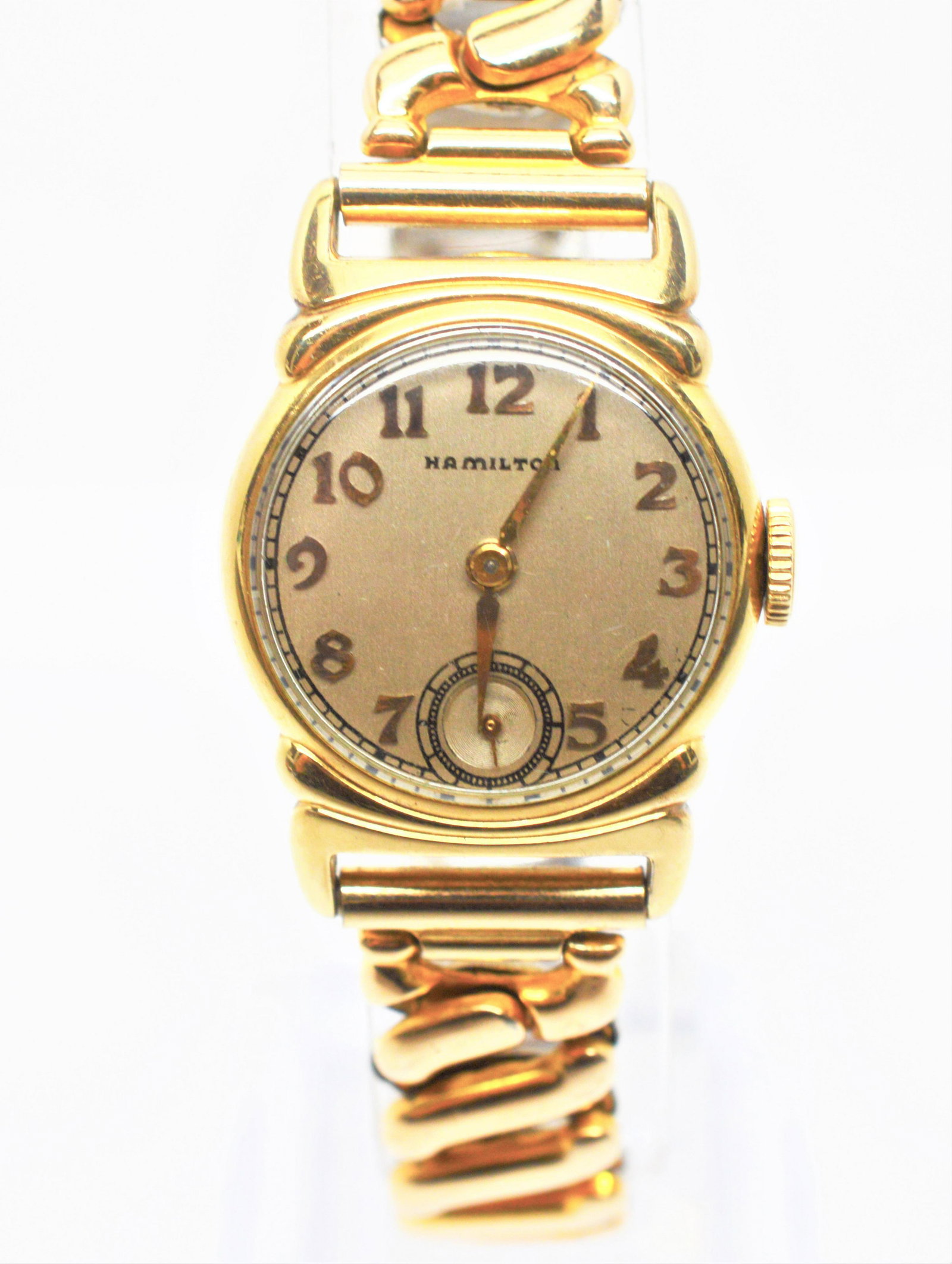 1940's Ladies Hamilton Wrist Watch: Hamilton 928 14K gold filled ladies wrist watch with original expandable bracelet. Serial No. J78313 19 Jewels. Mint Nickel Movement. Winder,Works Pre-owned