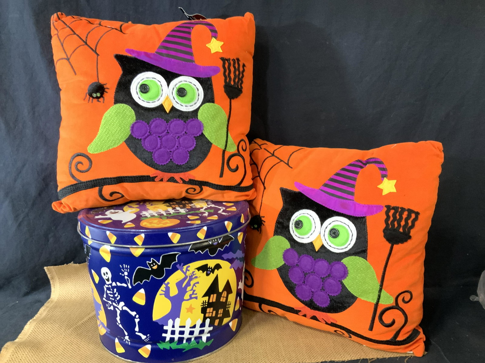 New Halloween Pillows and Storage Canister, 3: New in package are 2 plush Halloween pillows with an appliqué witchy owl, spider and spider web. Original tags attached, Pier 1 Imports. Pillows measure 12 x 12 in. Additional Halloween Metal Caniste