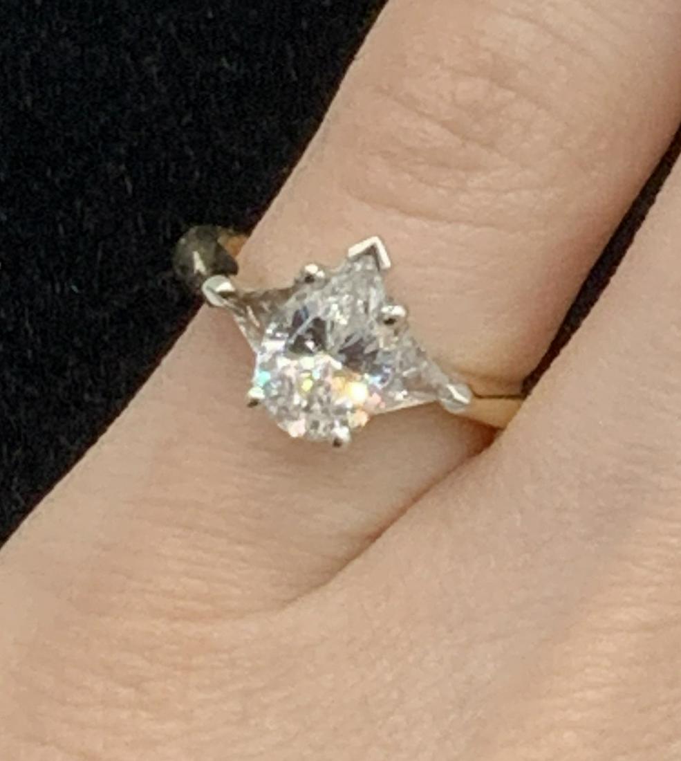 14 K Gold Cocktail Ring: Pear shaped Crystal Solitaire flanked with a trilliant crystal, one trilliant missing. Set in 14 K Yellow Gold and marked 14K LID. SIZE 4.75 2.8 dwt total weight. 14k Yellow Gold ring, Cocktail Ring, 