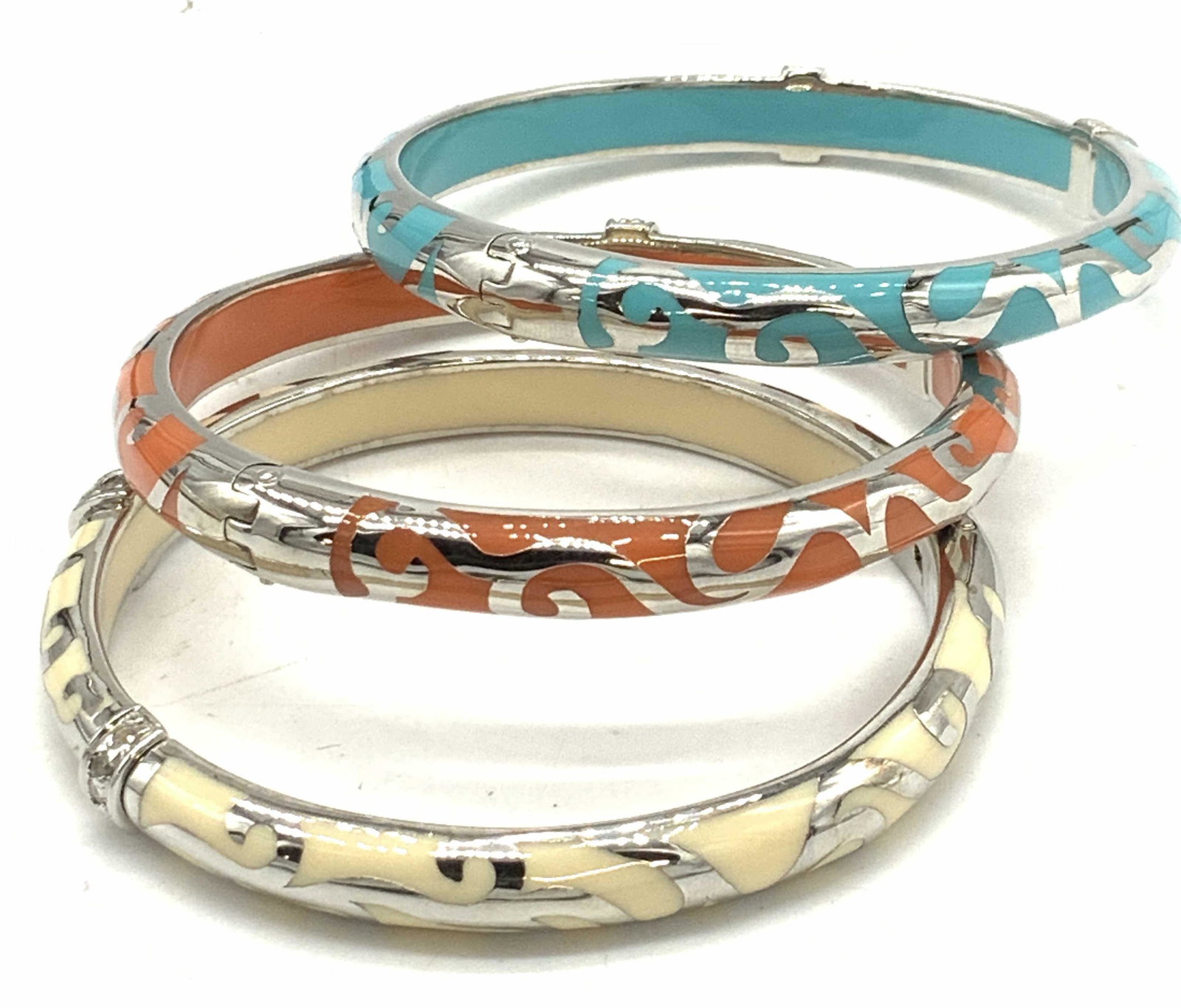 3 Angelique de Paris Stackable Sterling Bangles, 4: 3 Angelique de Paris Stackable Sterling Bangles, 4AngÃ©lique was enamored of all things artistic: the fine arts, literature, textiles, opera, architecture and classical music. During her thirteen ye