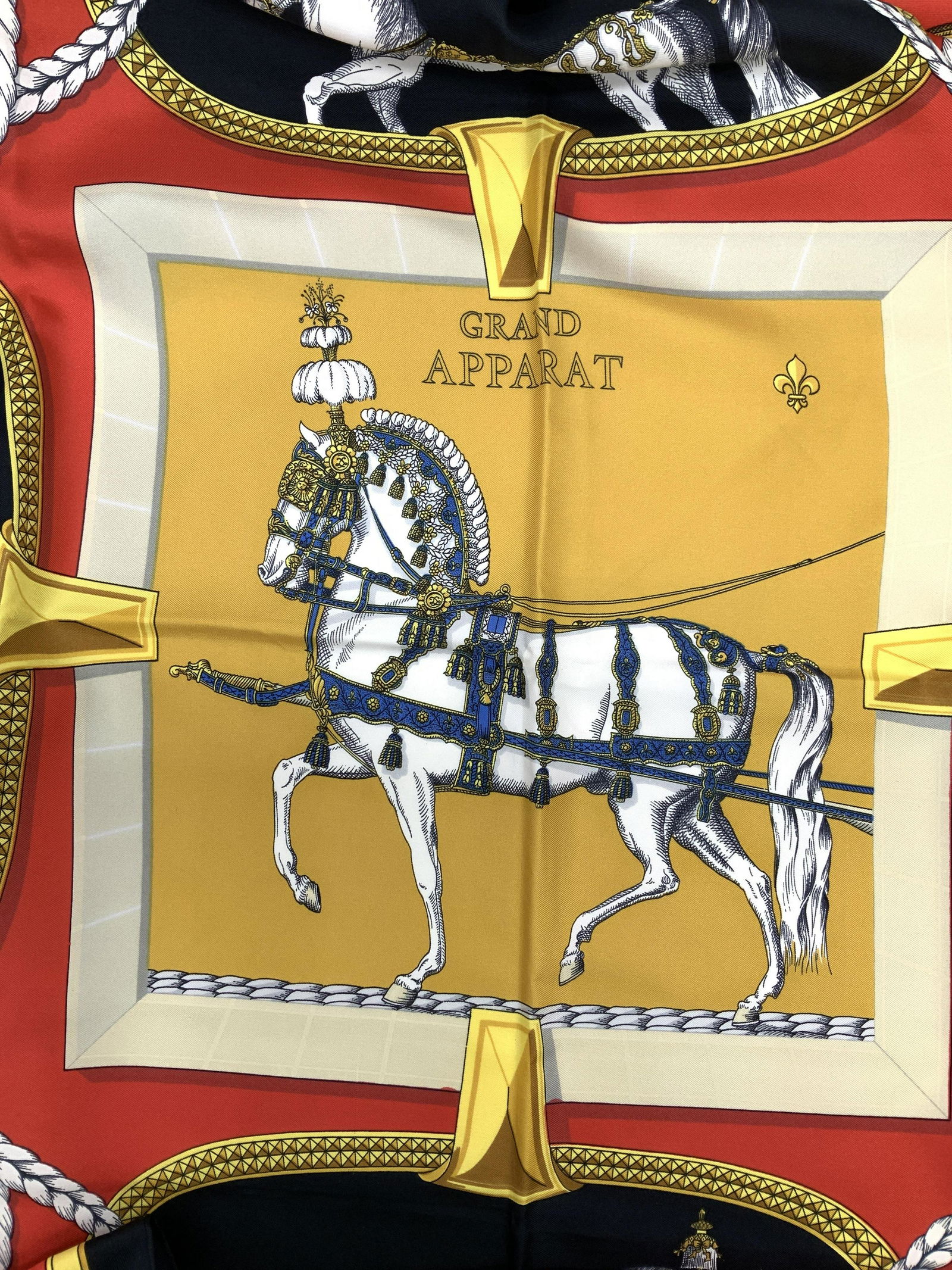 HERMES Sgn Jacque Eudy Grand Apperat Scarf, FR: HERMES Sgn Jacque Eudy Grand Apperat Scarf, FRThe HermÃ¨s scarf is the epitome of luxury, intensely detailed with the process of engraving the printing screens alone taking 750 hours. Each scarf req