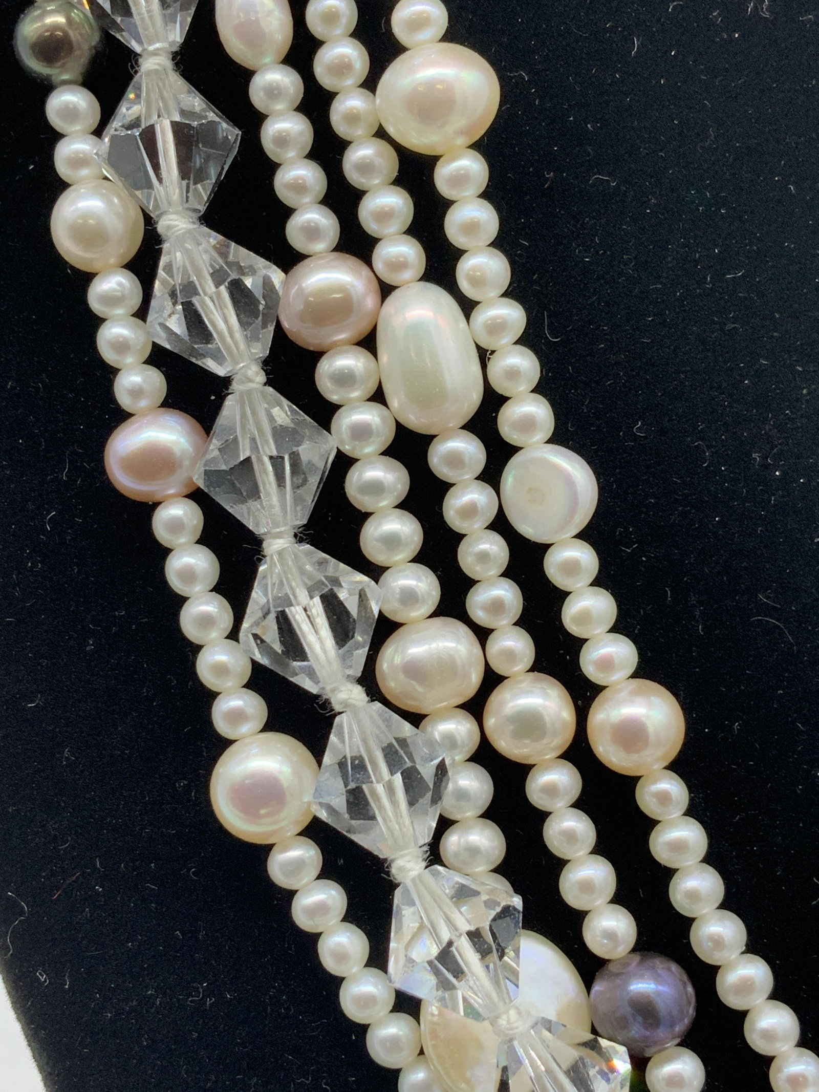JKa Lux Multi Strand Pearl Choker w 14K Clasp: Romantic Pearl necklace, multi strand with seed bead and freshwater pearls. One strand of AB crystal beads highlight the peach, blush, and black iridescent luster of pearls. 16 in. Hallmarked clasp re