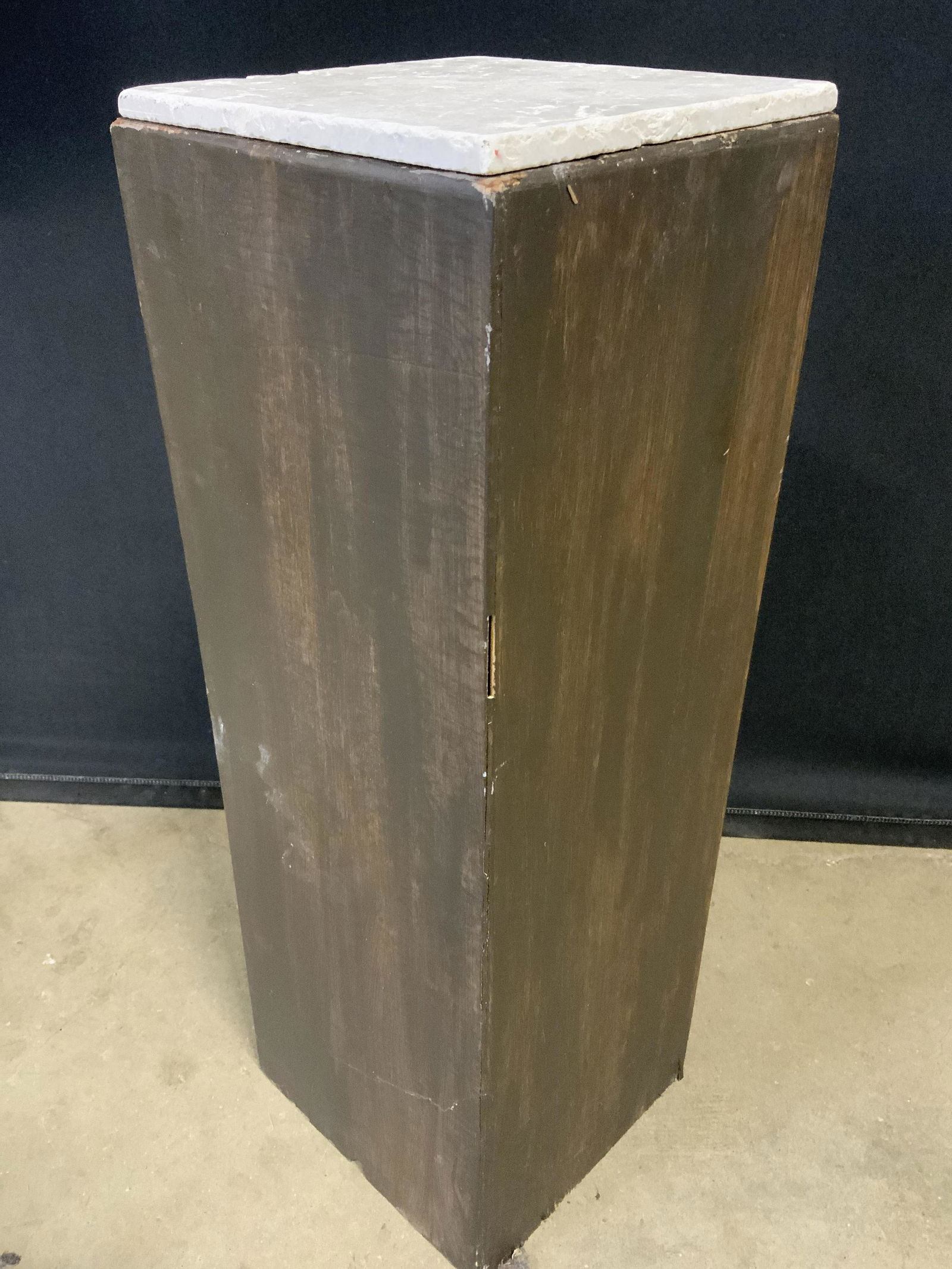 Vintage Veneer & Composite Pedestal: Pedestal is vintage. Piece appears to be wooden possibly veneer. Top of piece appears to be composite possibly stone. Piece measures approx 24 inches tall 8 inches square. Pedestal, vintage pedestal,