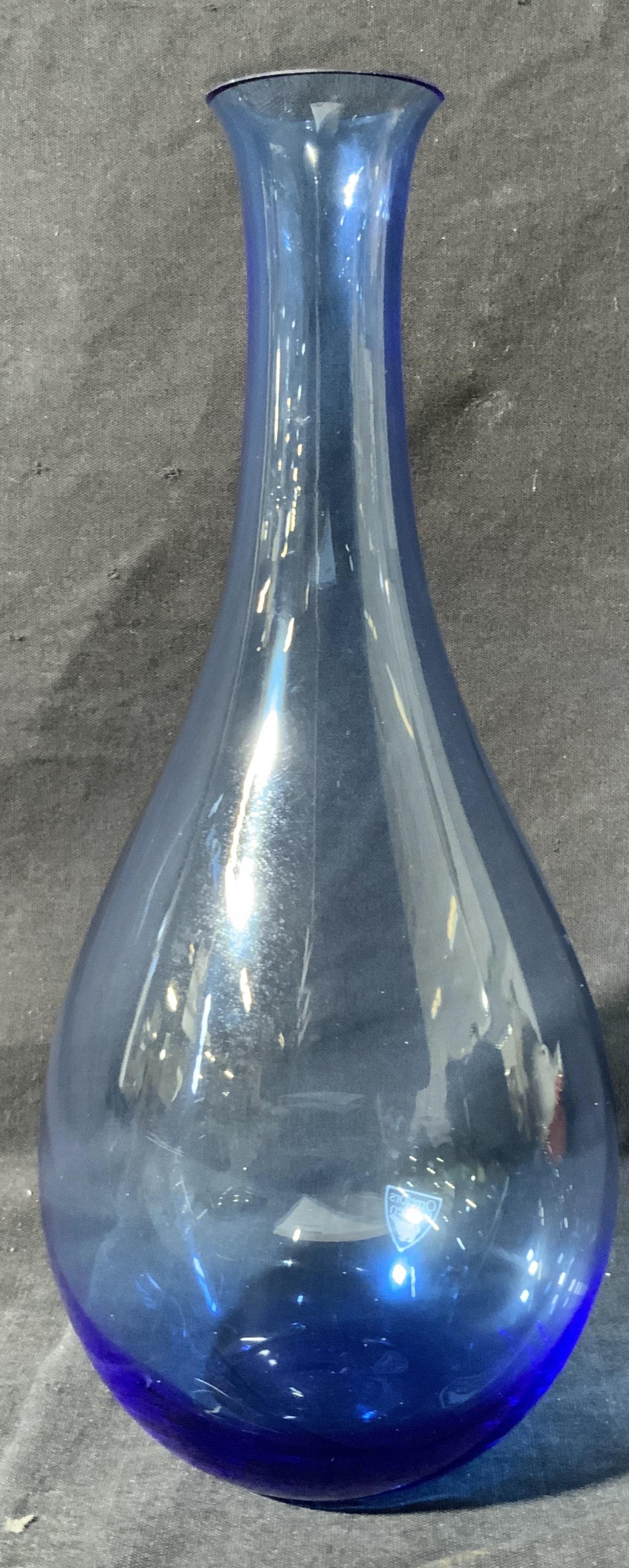 ORREFORS SWEDEN Blue Glass Vase: ORREFORS SWEDEN Blue Glass Vase, underside reads ‘ORREFORS’, hallmark to lower body reads ‘ORREFORS SWEDEN’, subject a translucent blue glass vase with a tapered neck, measures 9 1/2 x 4 1/2 x