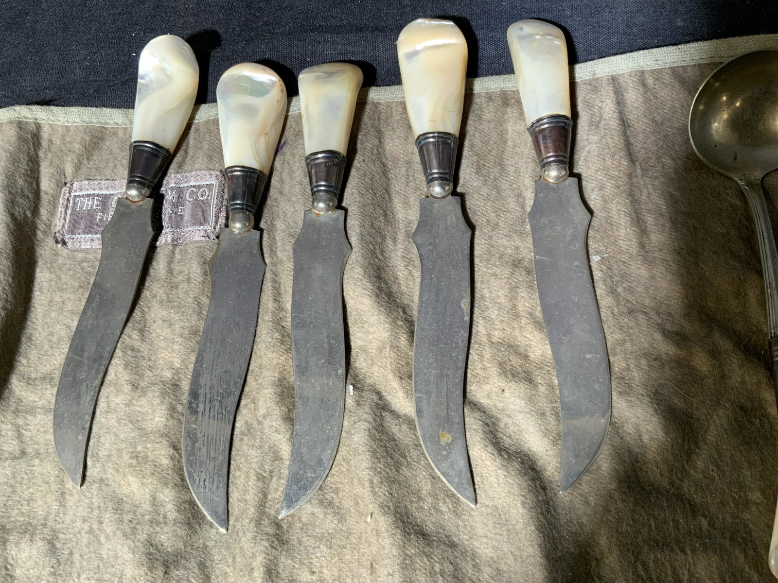 The Gorham Co. Cheese Knives Set: The Gorham Co. Cheese Knives Set, measure from 5 3/4 inches to 6 1/4 inches in length, handles are made of a pearlescent like material, wear consistent with age and use, one knife could be repaired. K