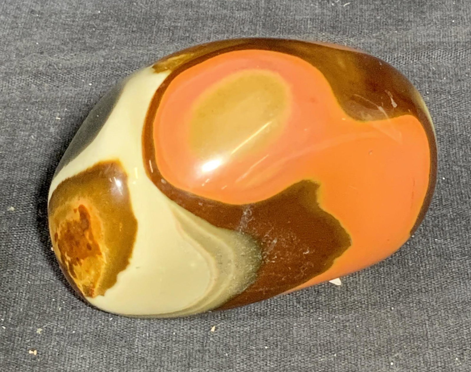 Polished Banded Agate Decorative Accessory: Polished Banded Agate, measure 3 l x 2 w x 2 h inches, wear consistent with age and use. Banded Agate is considered as a great stone for healing mind, the body, and the spirit. It is used for protecti