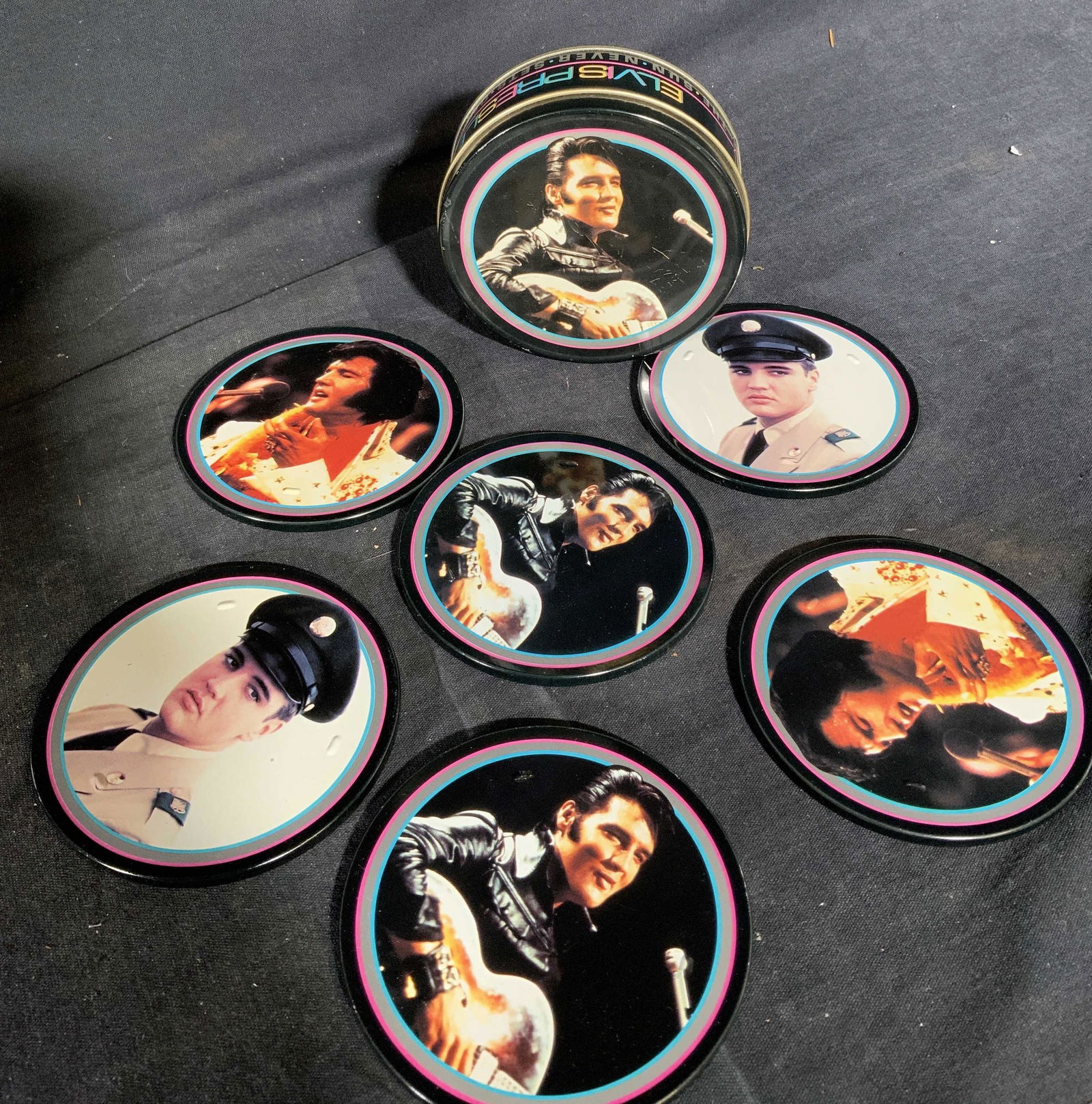 Vintage Elvis Presley Cork Coasters in Tin Case: Elvis Presley Cork Coasters In Tin Case, each measures 3 1/2 inches in diameter, wear consistent with age and use. Coasters, decorative coasters, vintage coasters, vintage decor, vintage Elvis Presley