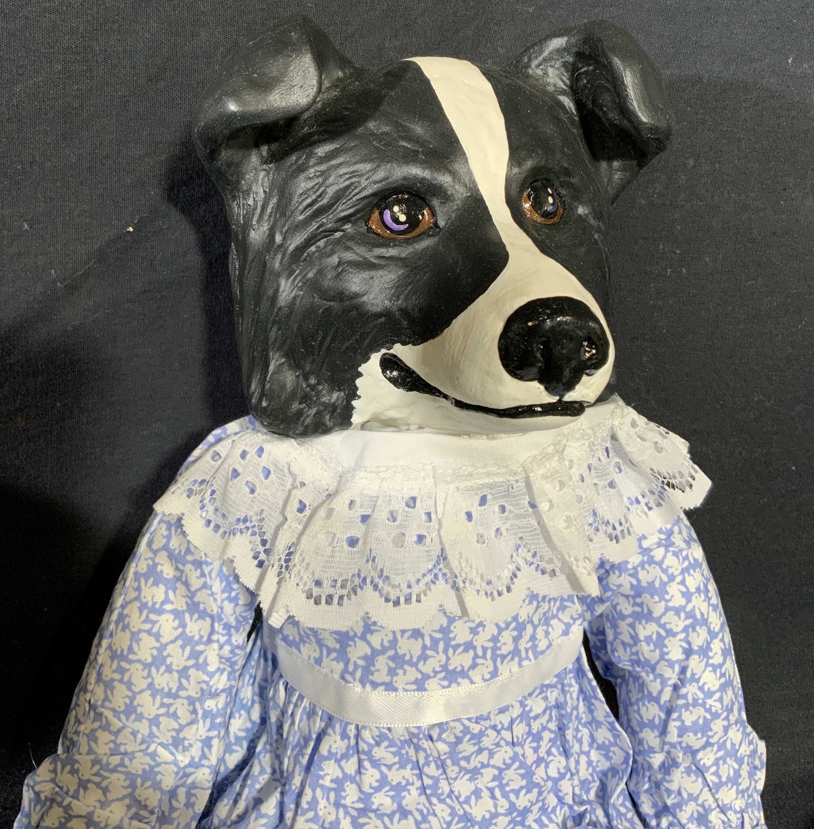 Hand Painted Ceramic Border Collie Doll: Hand Painted Ceramic Border Collie Doll! Depicts a border collie in a blue dress with small white rabbits as a pattern,, signature to feet, Paws and head appear to be ceramic and hand painted. Wear is