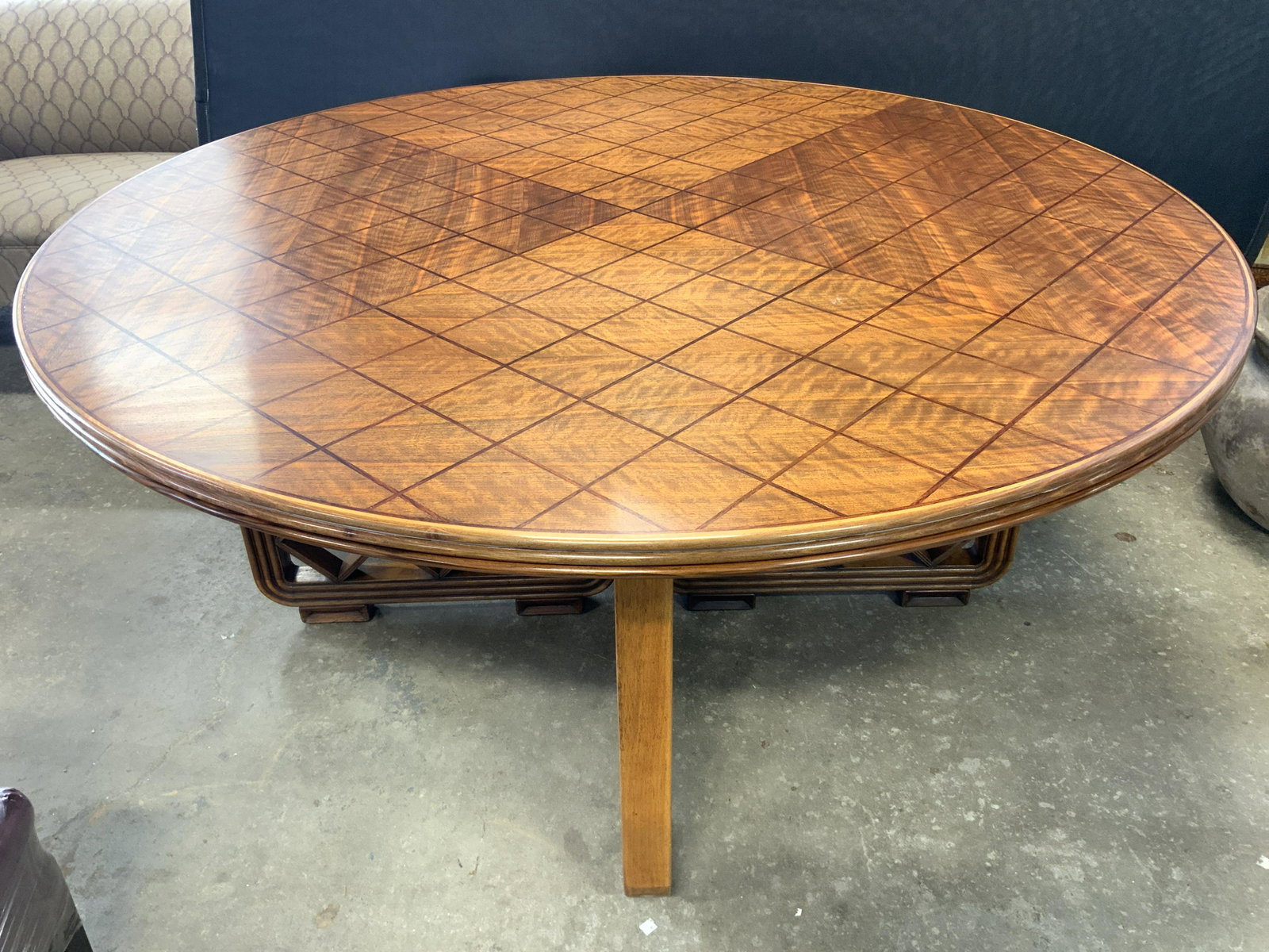 Italian Late Deco Table W Parquetry C 1940’s: Table has Chinese inspired chippendale base. Piece has circular tabletop with inlaid wooden diamond shaped parquetry detail. Italy circa 1940’s. Each portion of base has 2 feet. Piece measures appro
