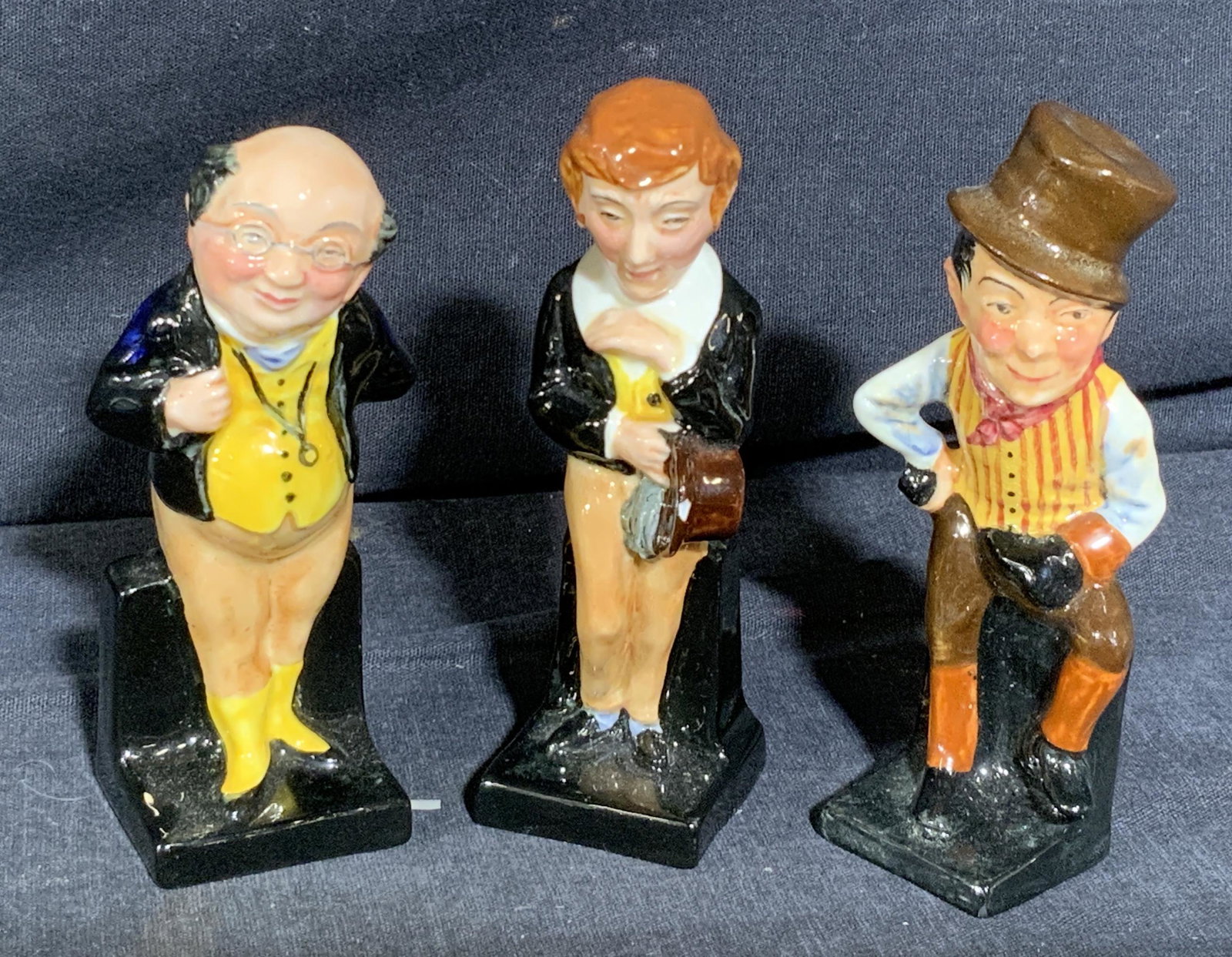 Vintage ROYAL DOULTON Fine Bone Figurines: Vintage ROYAL DOULTON Fine Bone Figurines OF PICKWICK, SAM WELLER, and David Copperfield, measure approx 4 1/8 inches tall x 1 1/2 inches wide, wear consistent with age and use. Royal Doulton, vintage