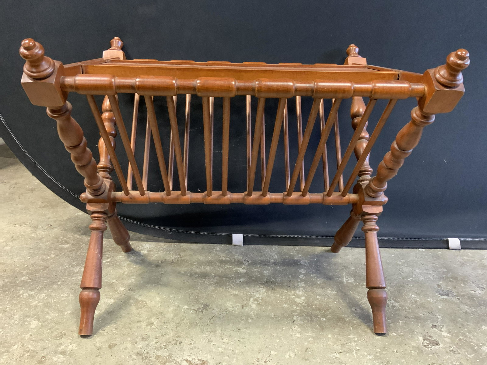 Vintage Carved Wooden X Shaped Canterbury: Piece is vintage and wooden. Canterbury has x shaped structure. Piece has center wooden platform. Piece measures approx. 22 inches long 20 inches tall 18 inches deep. Canterbury, magazine Holder, maga