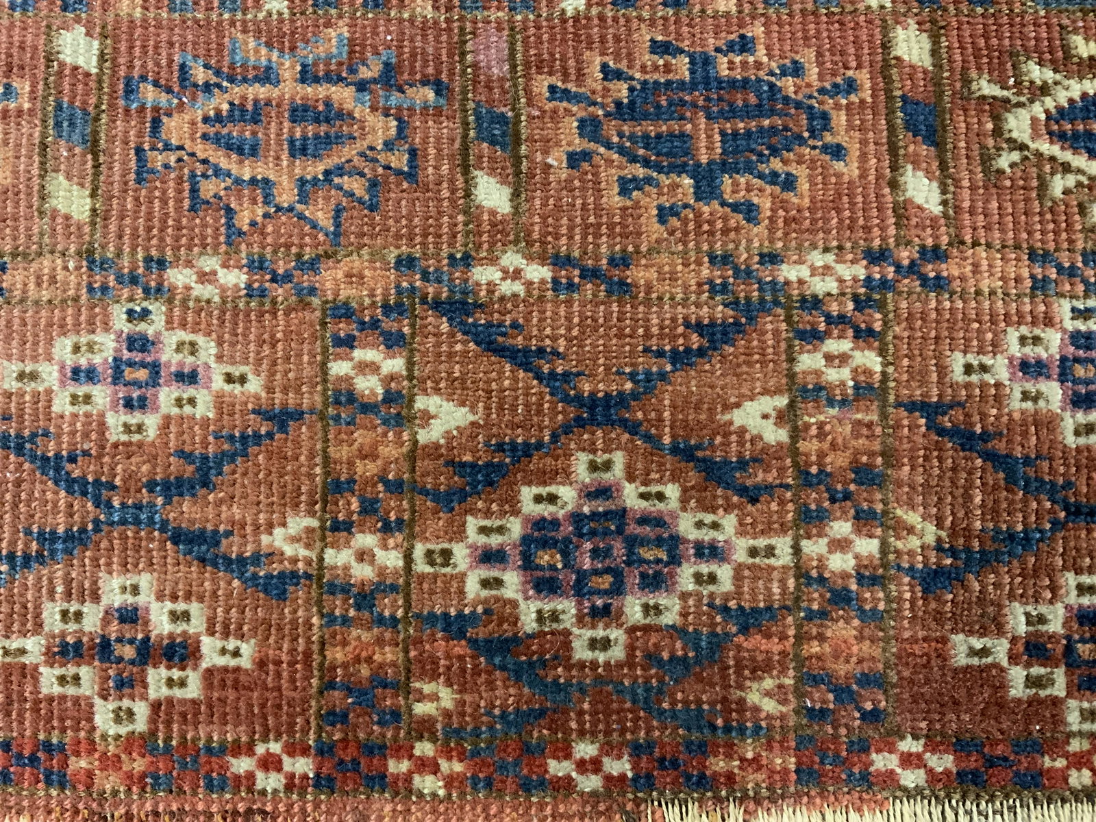 Vintage Handmade Wool Area Rug: Rug is wool and handmade. Piece is vintage possibly antique. Rug has intricate multi toned geometric detail. Piece measures approx 48 inch long 39 inches wide. Rug, carpet, area rug, wool rug, carpet,