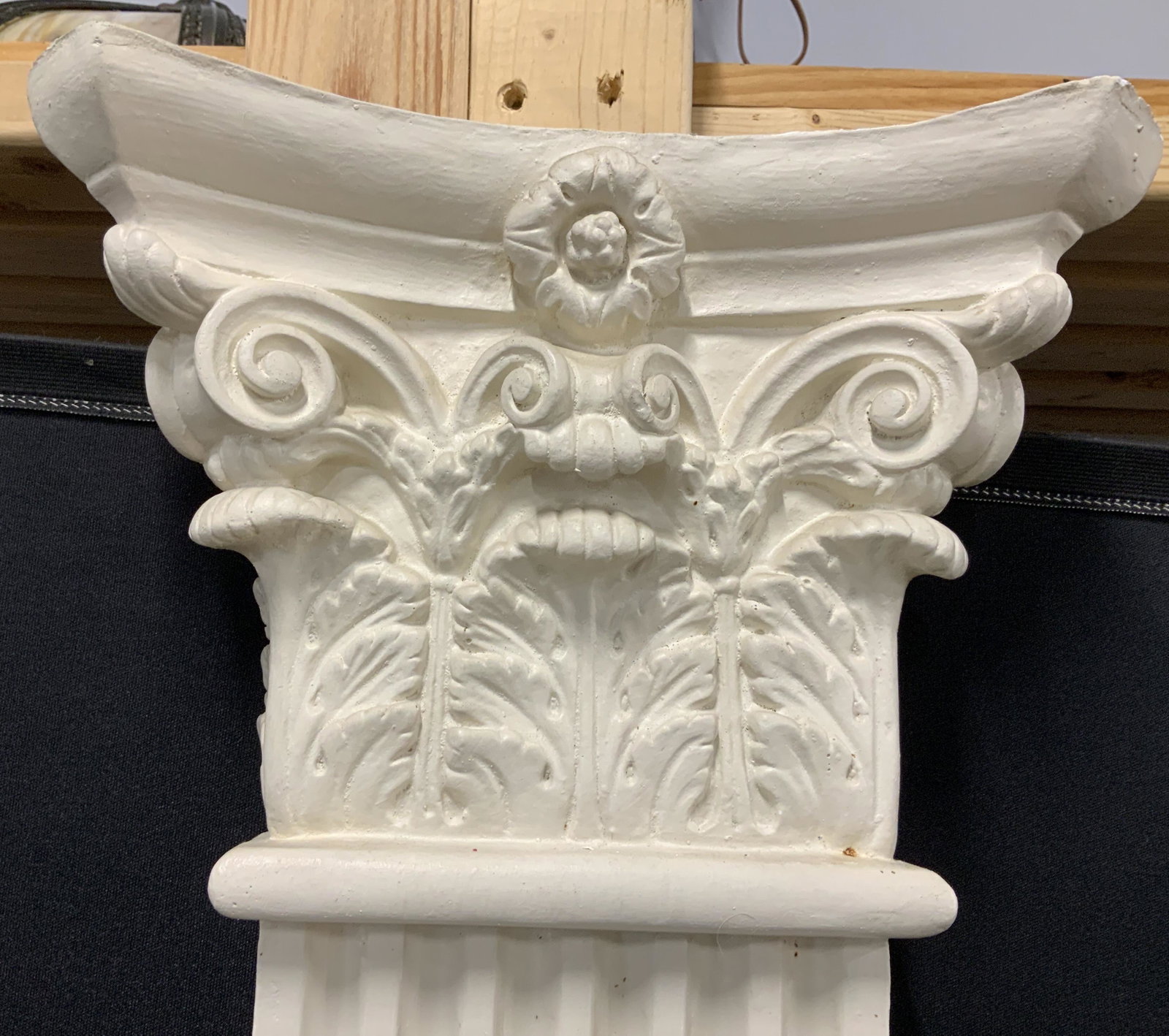Vintage Plaster Pilaster: Plaster pilaster, appears to be vintage. Cast acanthus detailing, fluted surface. Wear is consistent with age and use, chipping present. Measures approx 88.25 inches h, 13 inches w. Home decor, archit