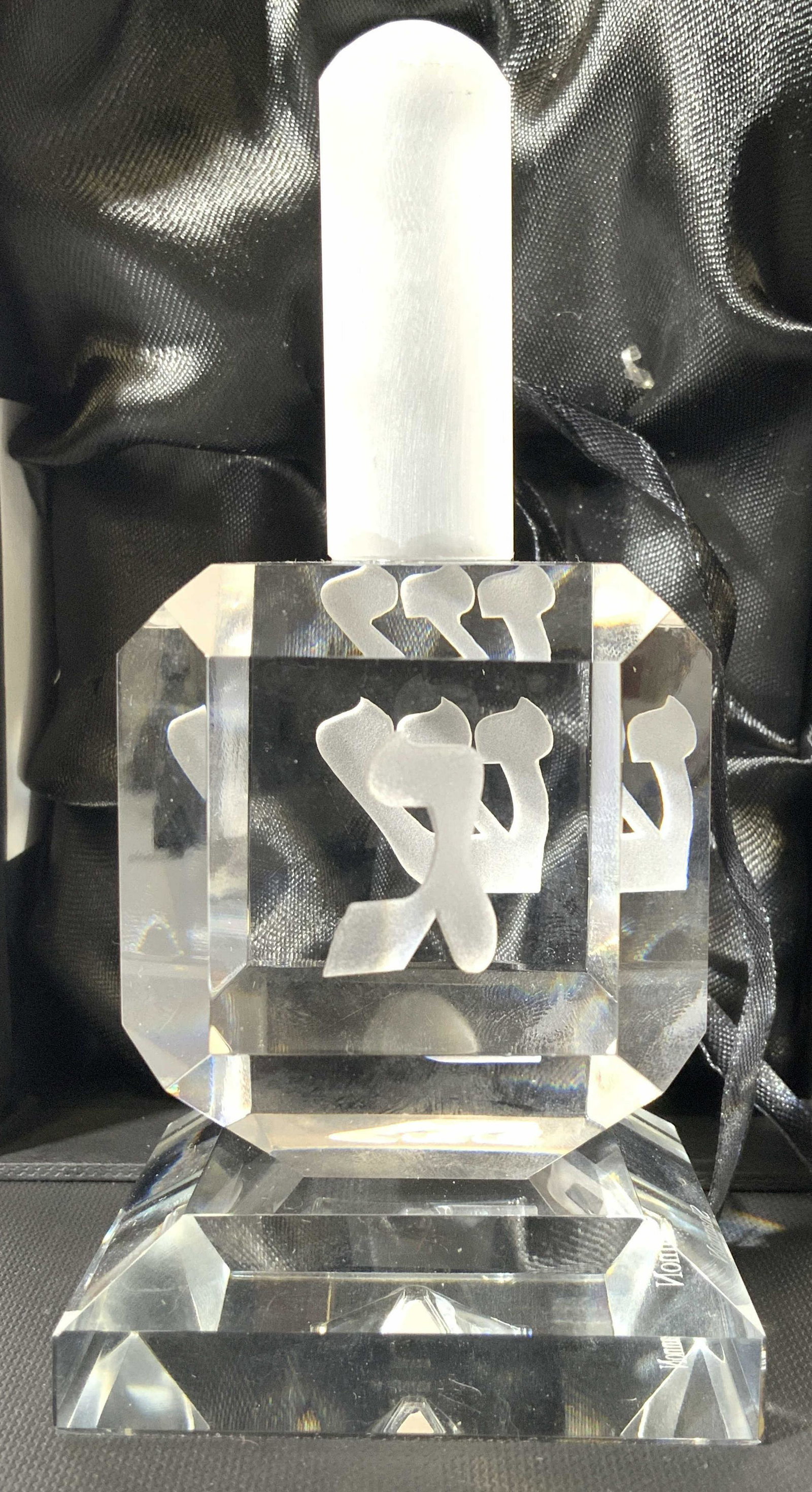 SHANNON Cut Crystal Dreidel W Base: Underside of base is marked SHANNON. Dreidel figure and base are cut crystal. Pieces include black box which reads LIGHTING BY DESIGN. Piece has frosted Hebrew character detail. When standing on base 