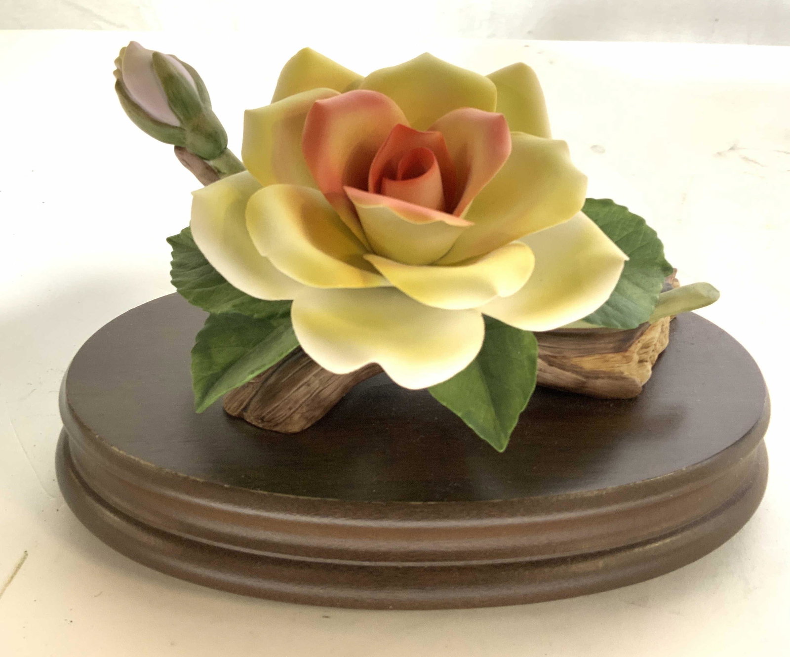 Andrea by Sadek Music Box: Floral porcelain figural on wood base, wind up music box, the San Francisco music box company, romance, measures 5 inches ht length app 8 inches