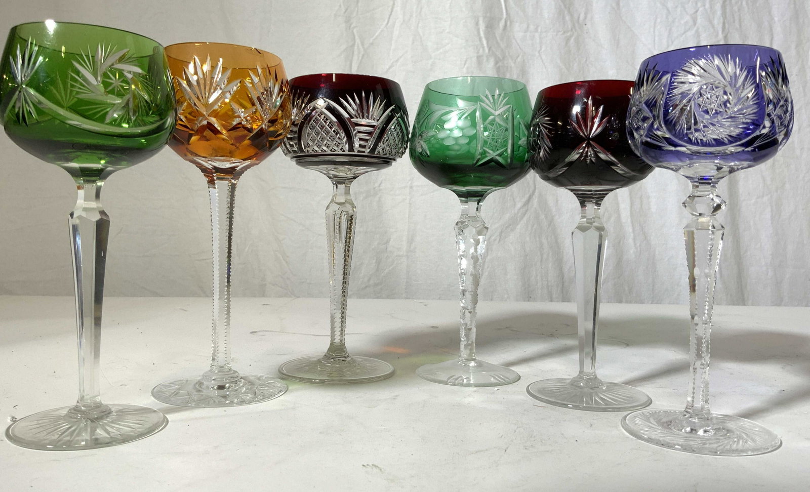 6 Colorful Bohemian Glass Stemware: Crystal goblets, similar patterns, assortment of six, tallest measures ht 8 inches diameter approximately 3.5 inches, wine glasses, water glasses, goblets, crystal cut crystal blue green Ruby red, ora
