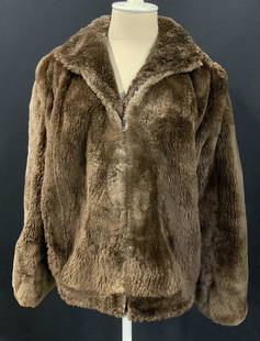 Faux Fur Brown Woman’s Coat: Faux Fur Brown Womanâ€™s Coat, interior lined with polyester, embroidered letters read â€˜H.B.Lâ€™, possibly a small, wear consistent with age and use. Zipper should be fixed as stitchin