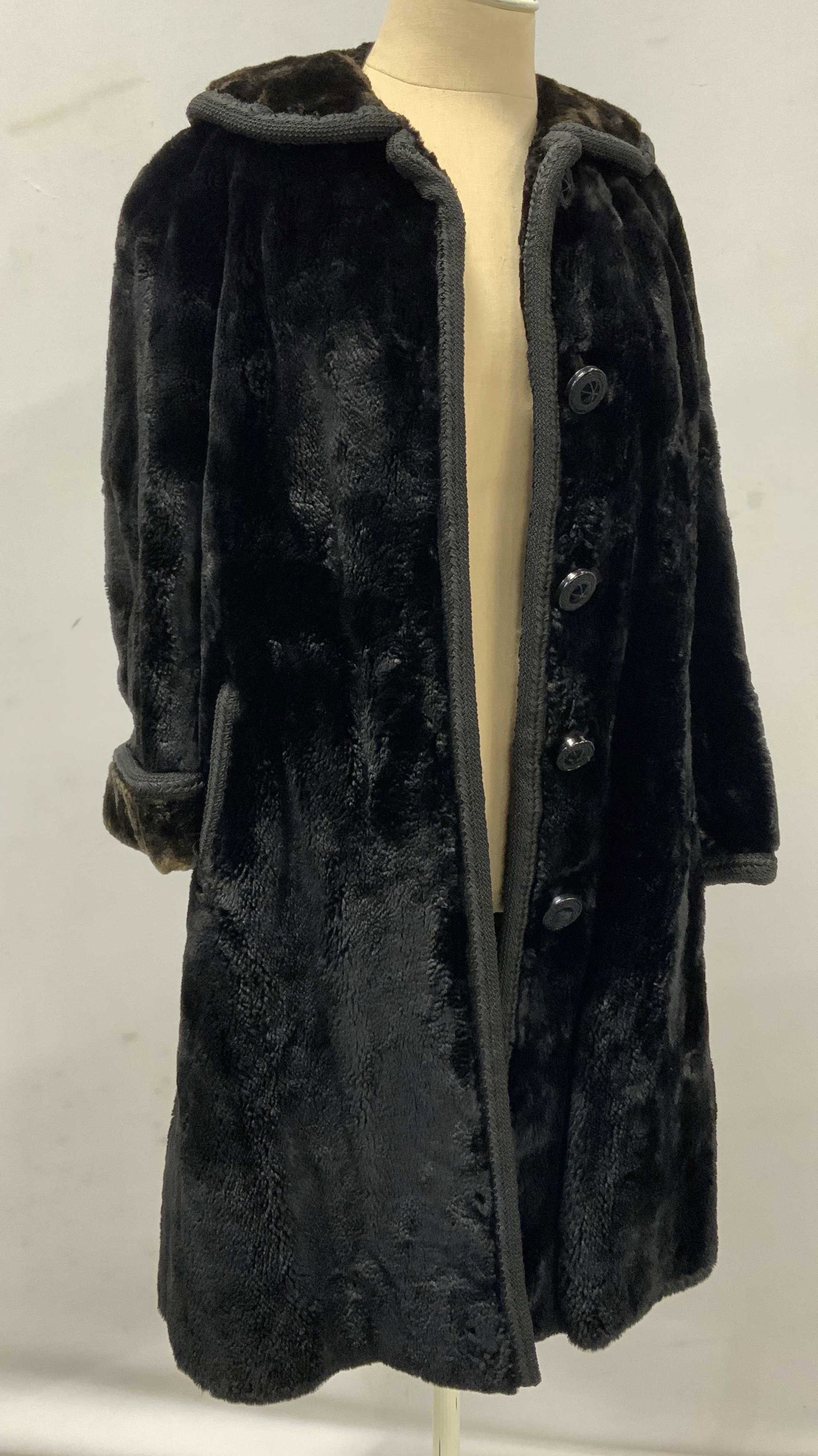 Vintage JAY THORPE NY Black Fur Coat w Trim: Vintage JAY THORPE NY Black Fur Coat w Braided Trim, has 5 buttons, inside has ‘ARS’ embroidered, waist measures approx 21 inches, has a total length of approx 40 inches, sleeve measures approx 29