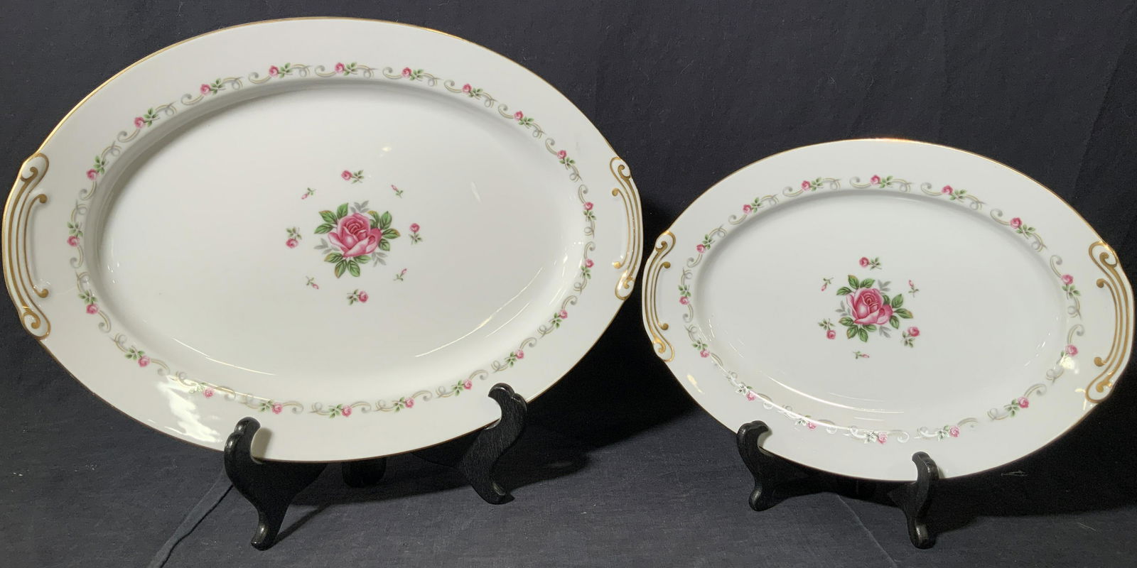 PURITAN 2 Japanese Porcelain Serving Dishes: A set of 2 porcelain serving dishes from Puritan marked on undersides ‘Puritan China First Love Japan’ with gold gilt rim and rose designs around outer edges of plates and large rose design in cen