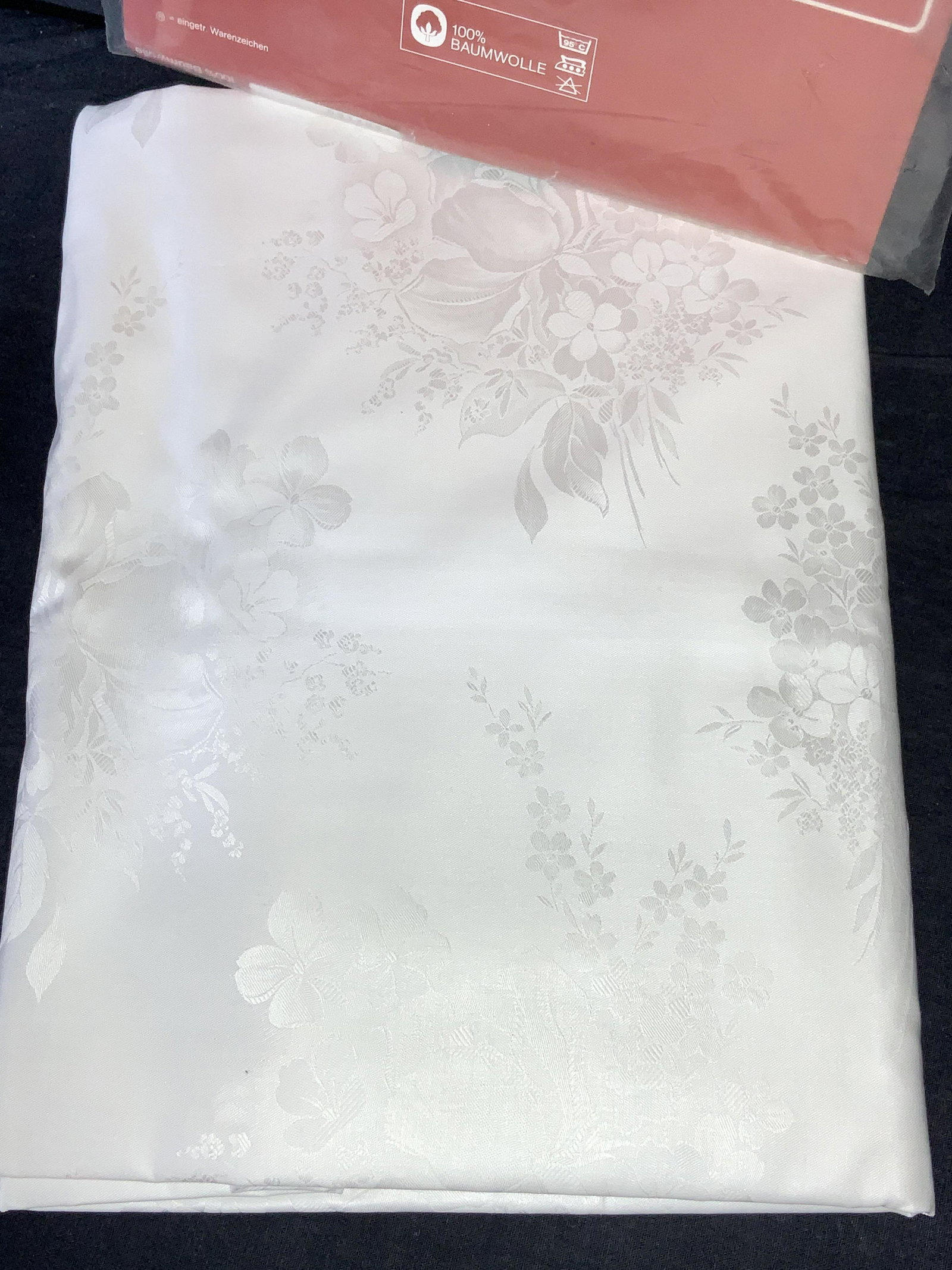 Collect. DIERIG fleuresse Cotton Tablecloth,NIP: Luxury white tablecloth, sateen cotton fabric, floral pattern. New old stock, not used and no color fade. Made in Germany, size on package reads 120/160 ( European Metric) . Absolutely stunning. Only 