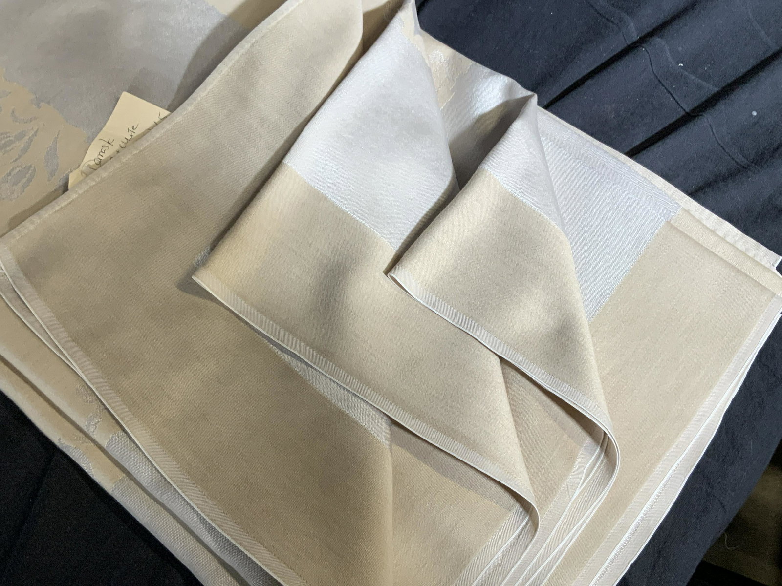 Tan & Beige Damask Vtg Formal Tablecloth: Neatly pressed table cloth. Feels like acrylic/ nylon blend. tan border with lighter beige inner border and damask flower design. App size 60 in. x 100:in. No apparent staining noted. Does have center